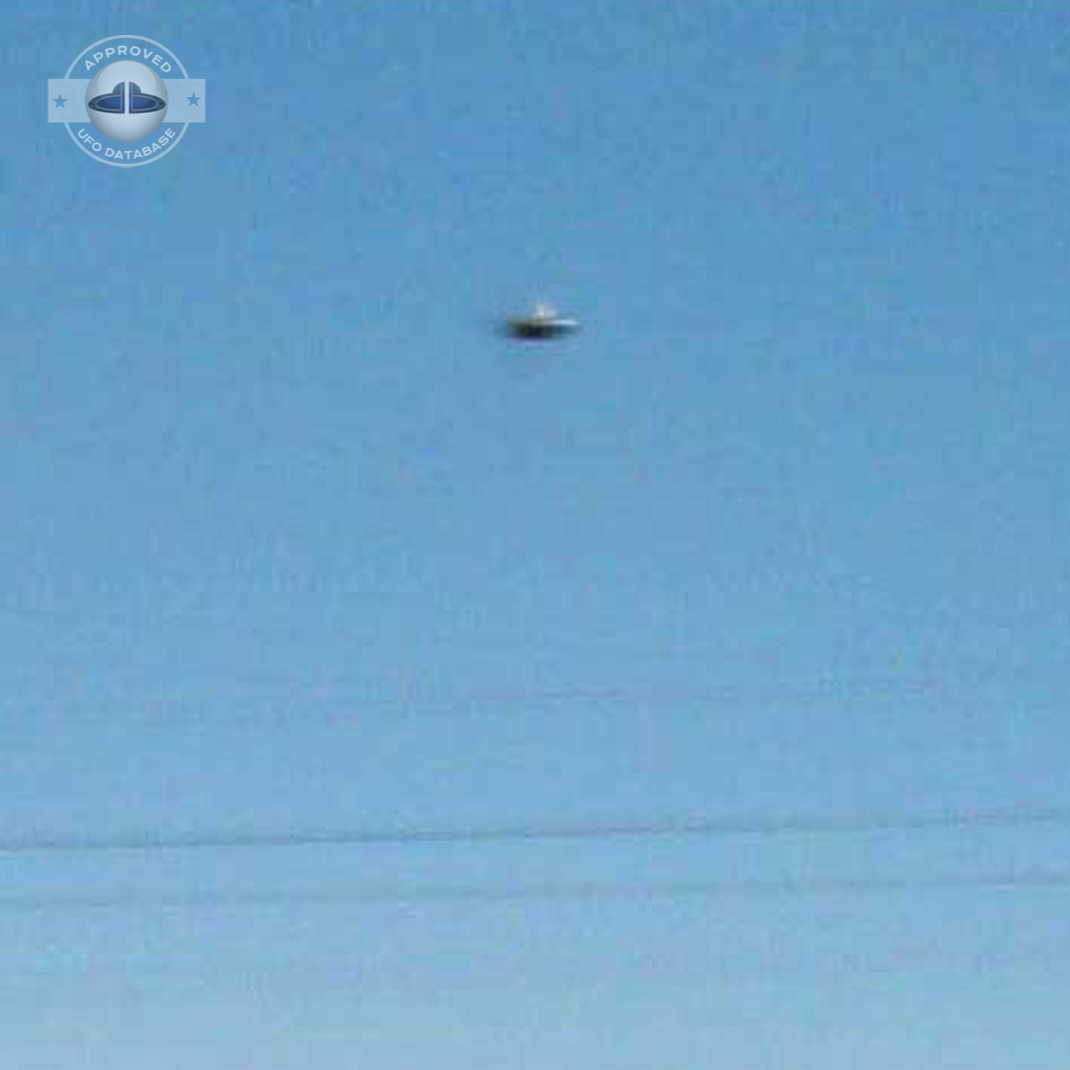 UFO picture showing UFO flying near railroad crossing UFO Picture #47-5