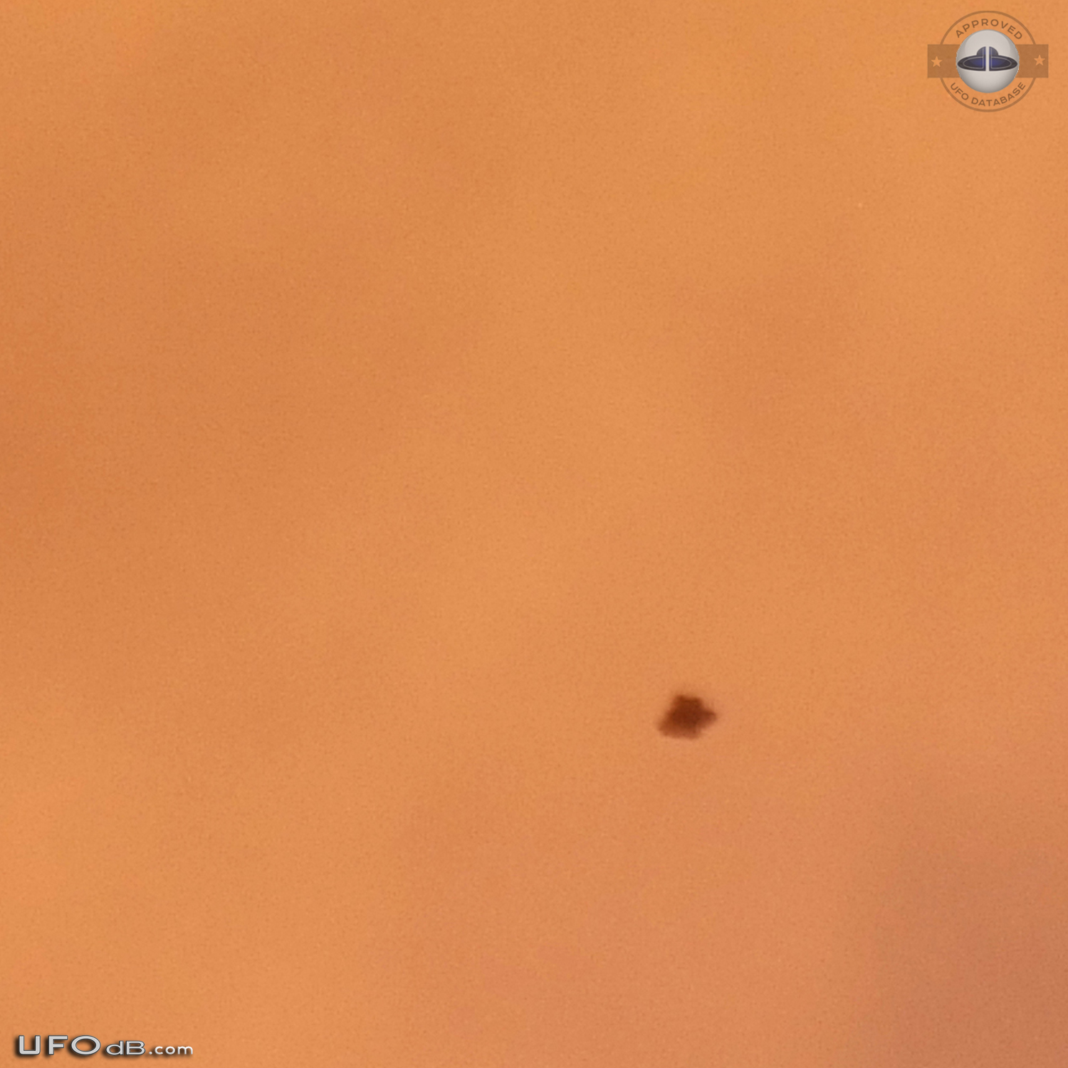 3 witness saw a black bell UFO disappearing in clouds - Australia 2013 UFO Picture #551-2
