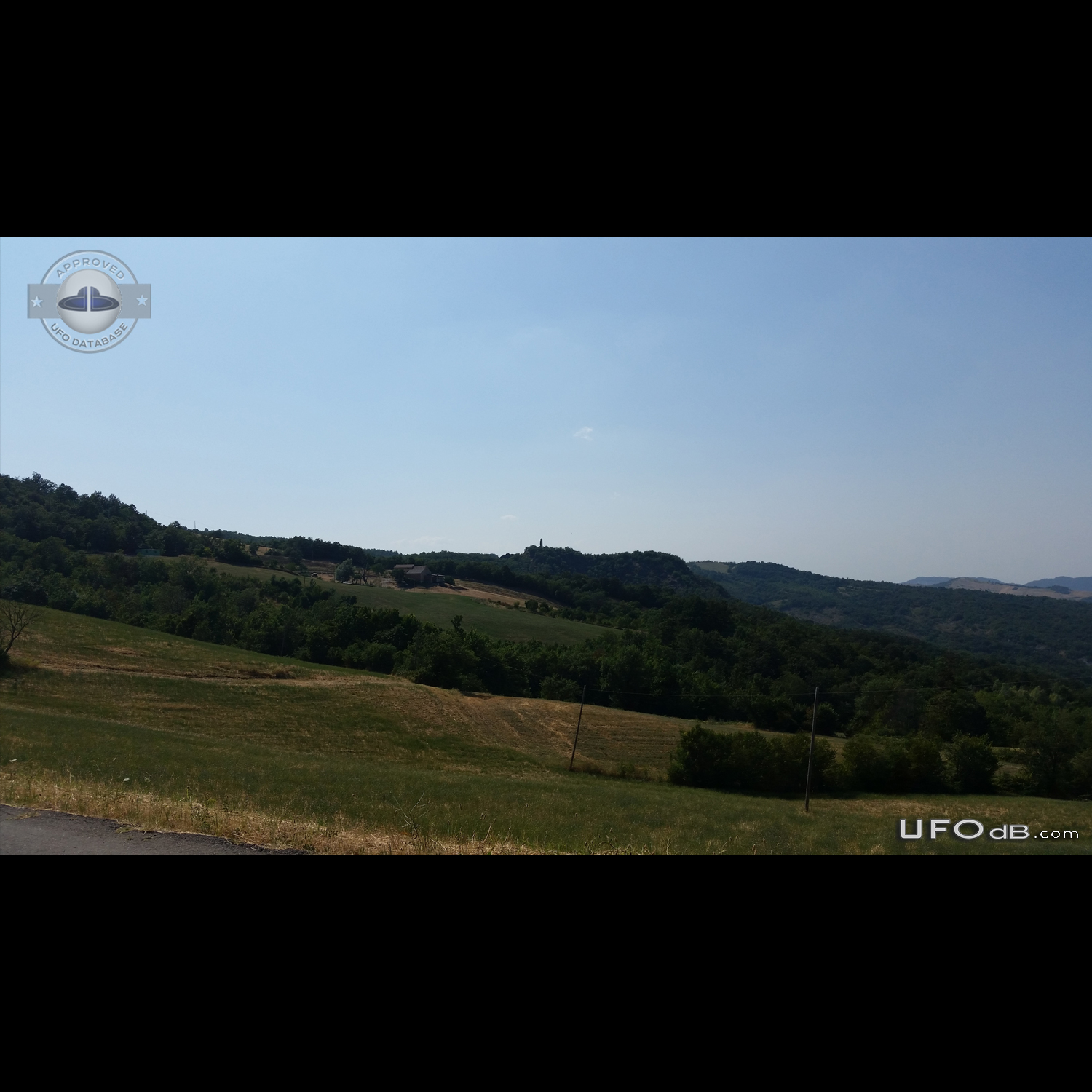 Black spherical UFO  near Tower Pellegrino Parmense Emilia-Romagna Ita UFO Picture #761-1