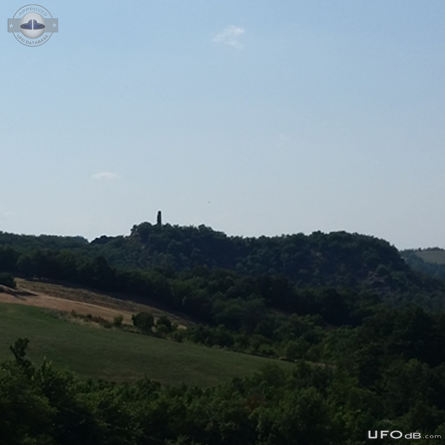 Black spherical UFO  near Tower Pellegrino Parmense Emilia-Romagna Ita UFO Picture #761-3