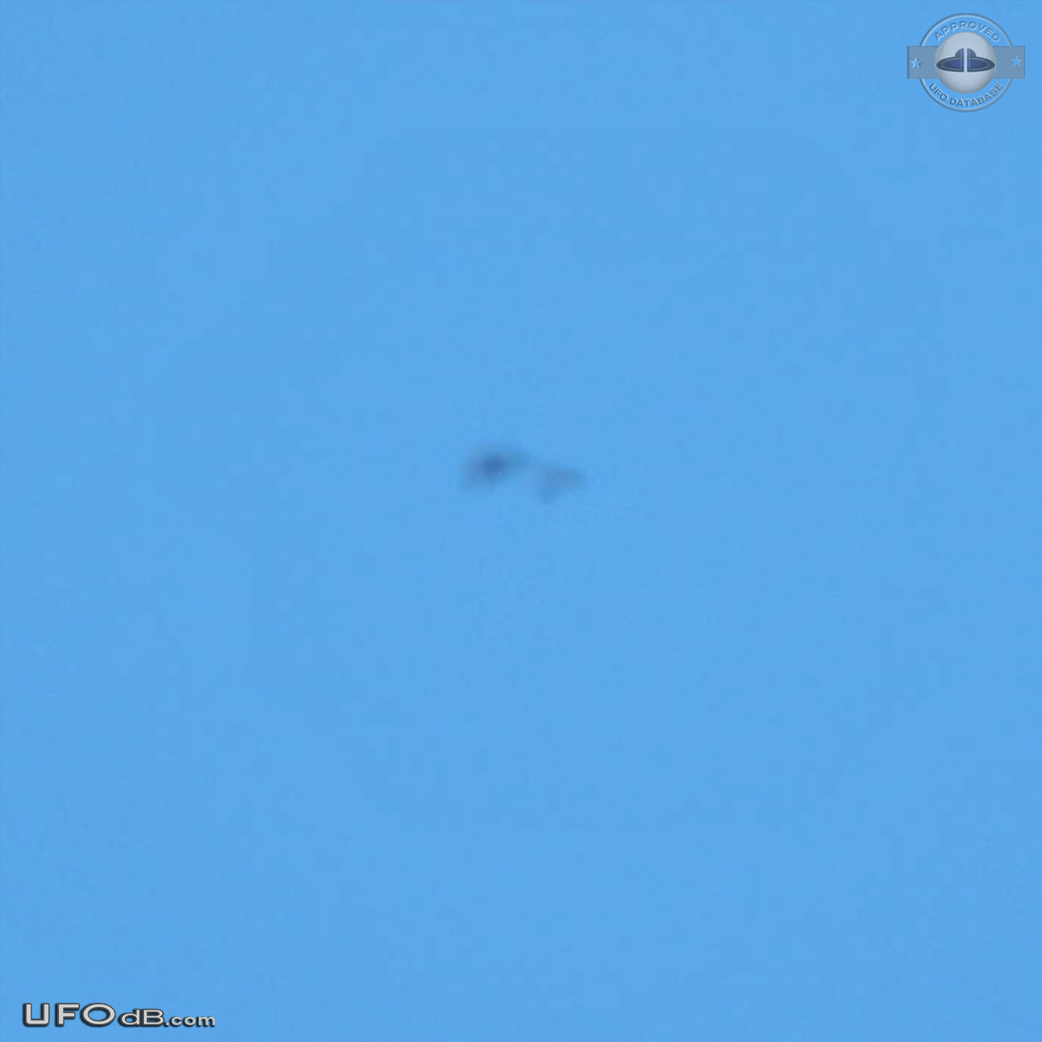 Blurry Photo of triangular UFO in the Blue sky of Hamburg Germany 2012 UFO Picture #496-1