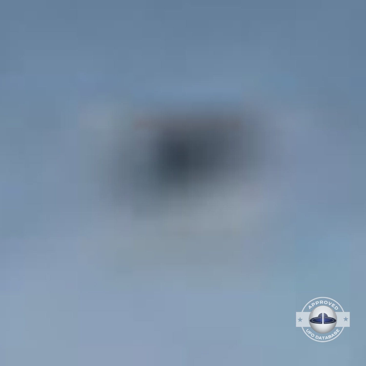 While taking a picture of 2 persons near lake Titicaca, capture a UFO UFO Picture #82-5