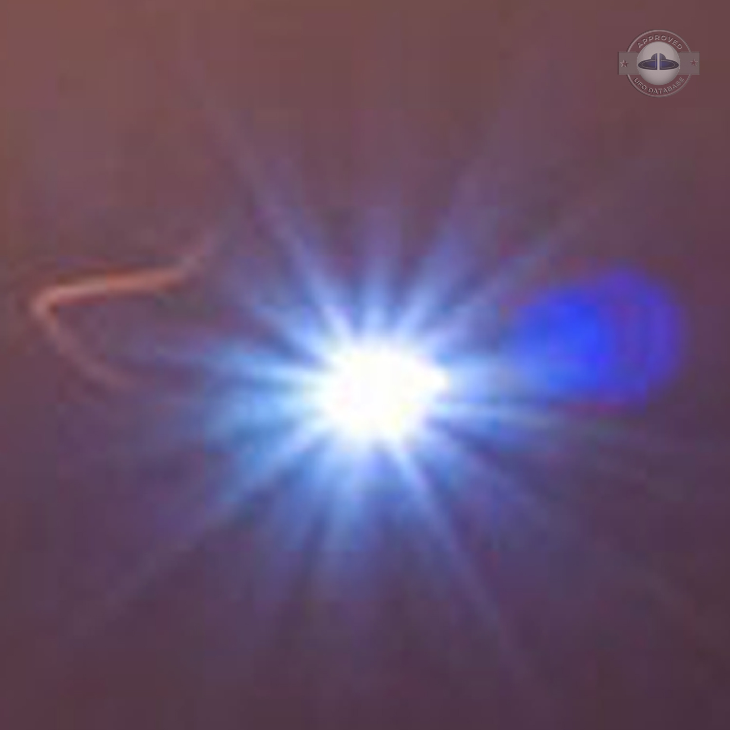 Bright glowing UFO caught on picture during long exposure | England UFO Picture #218-5