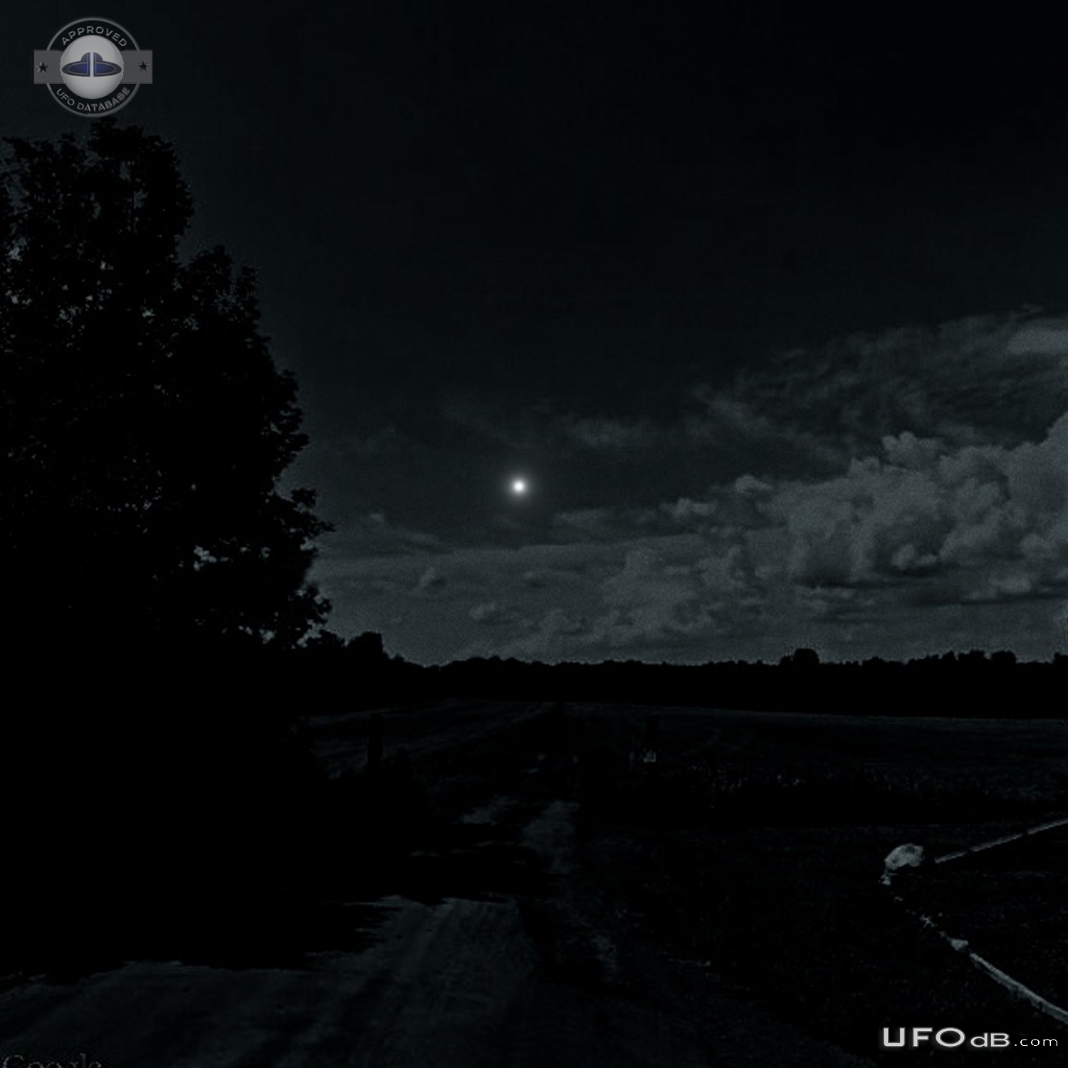 Bright white light UFO hovered continued on path then quickly faded ou UFO Picture #796-1