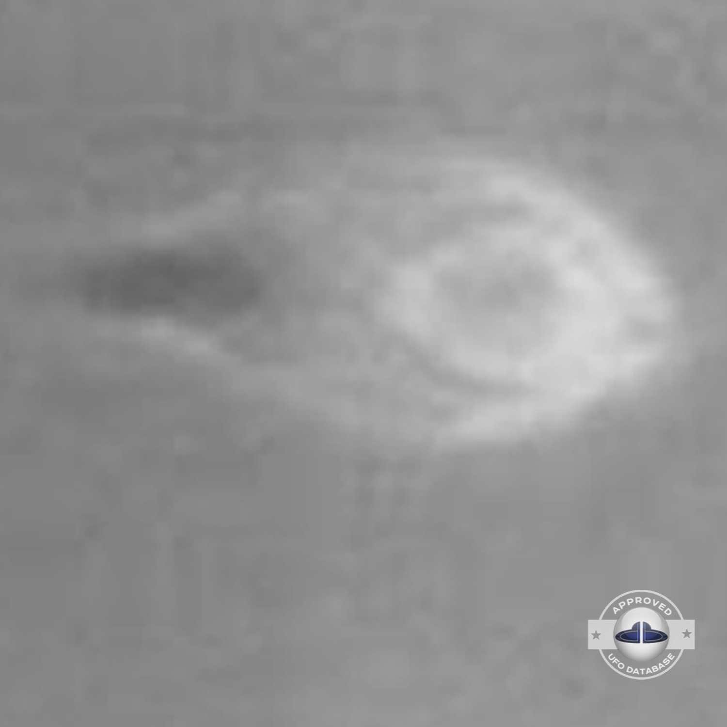 UFO moved straight in the sky stopping over flagpole of the city hall UFO Picture #87-5