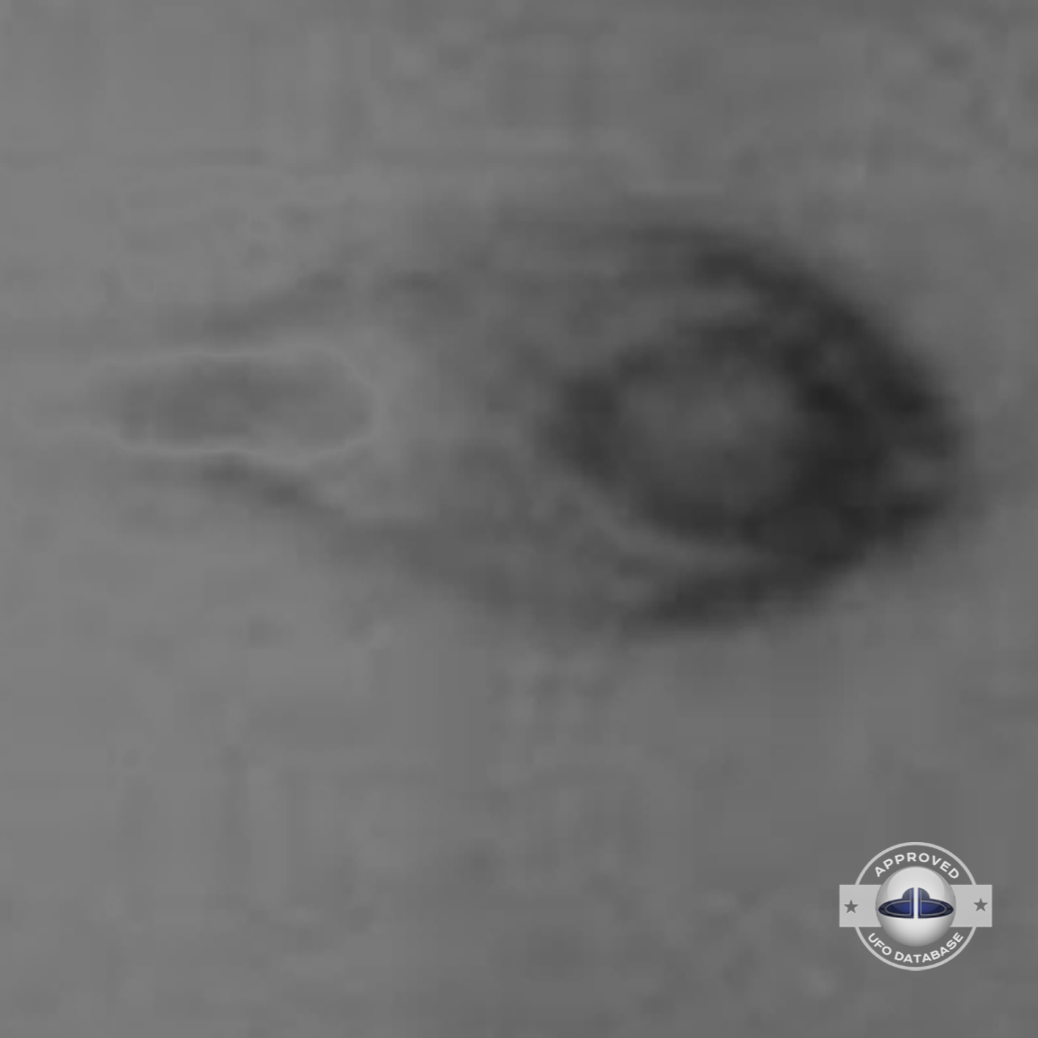 UFO moved straight in the sky stopping over flagpole of the city hall UFO Picture #87-7