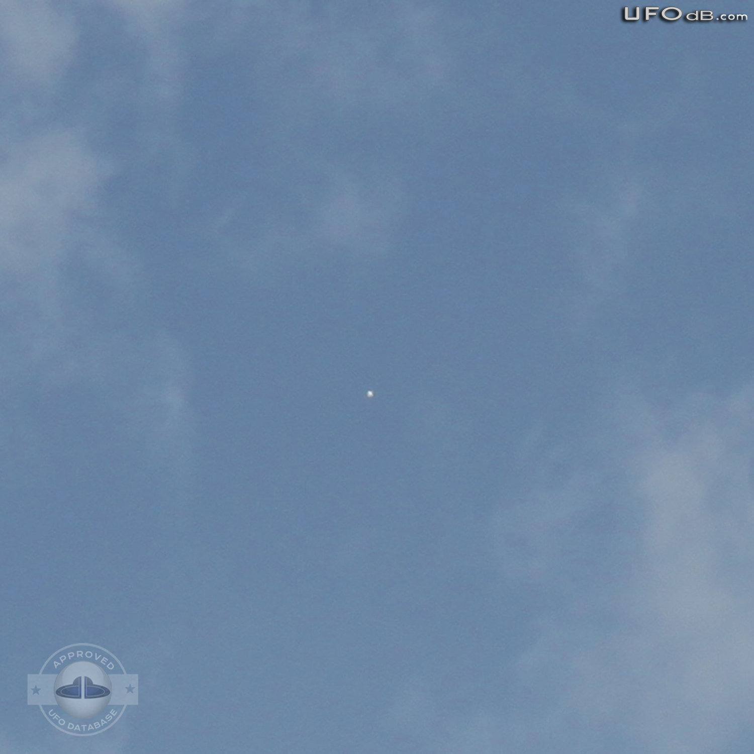 Couple on their balcony in Vienna sees a UFO and gets a picture - 2011 UFO Picture #367-1