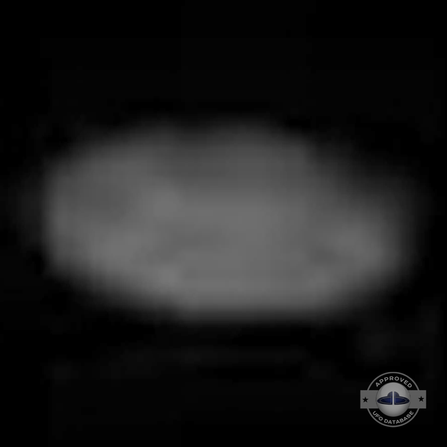 Bright white sky on which we can see the grey UFO Czaplinek, Poland UFO Picture #112-7