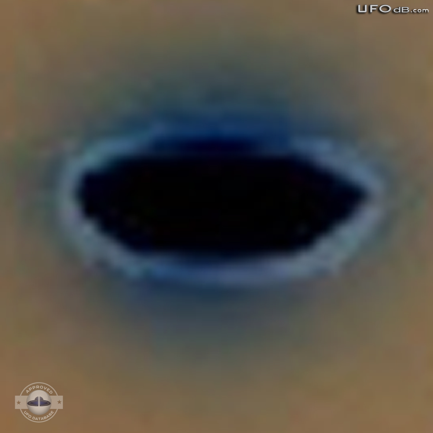 Darting UFO photographed from moving car | Bryncethin, Wales, UK 2011 UFO Picture #275-6
