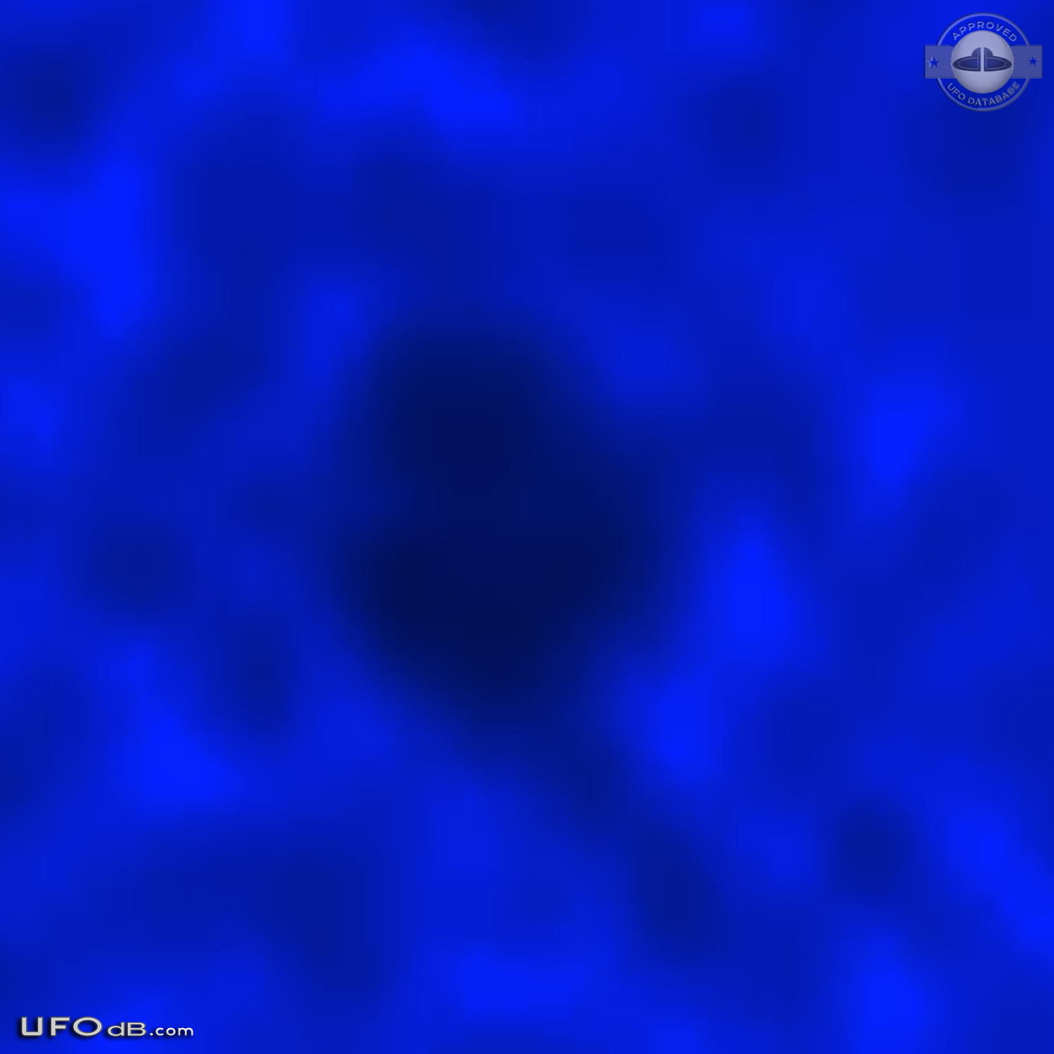 Donut Shaped UFO in blue sky over Blackburn North, Australia in 2012 UFO Picture #575-5