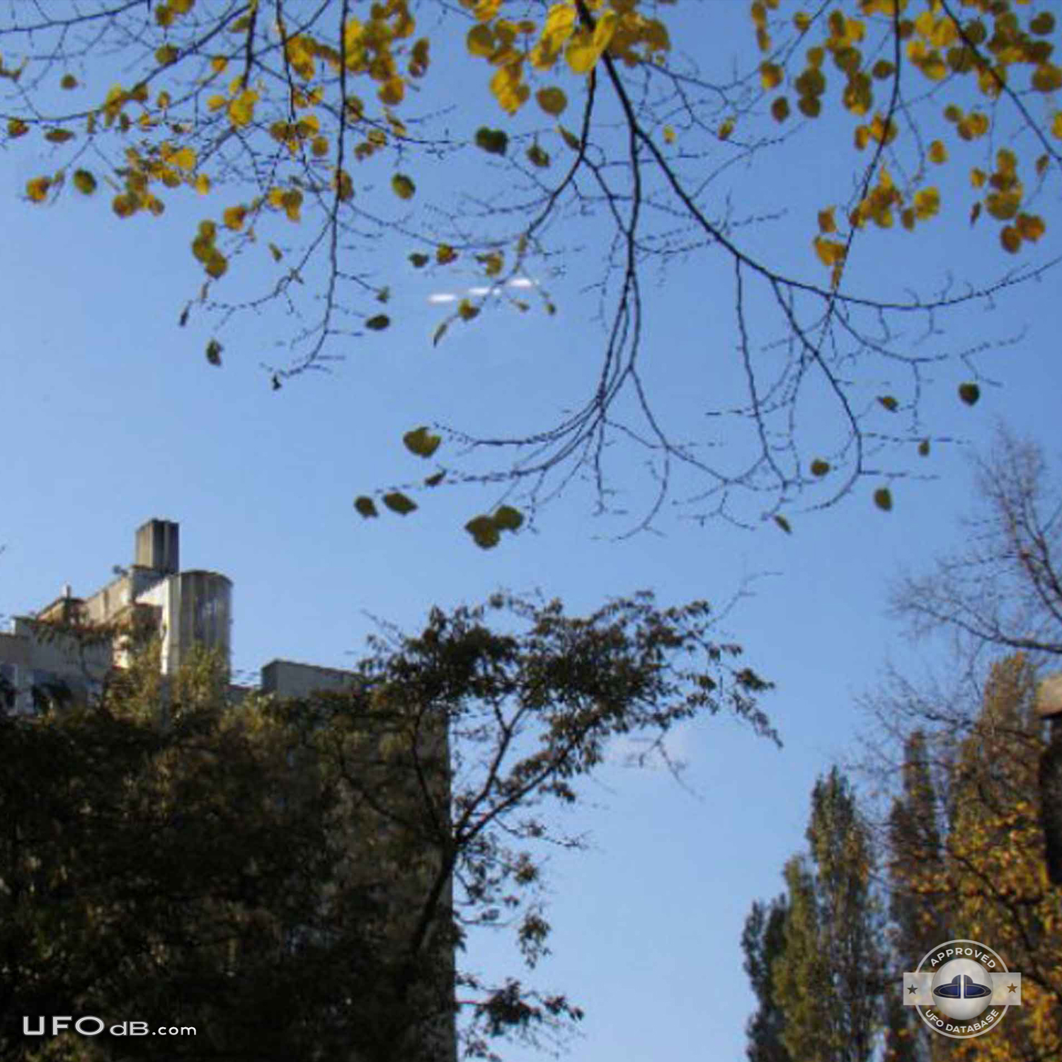 Fleet of 3 UFOs in formation caught on picture over Amsterdam in 2011 UFO Picture #378-1