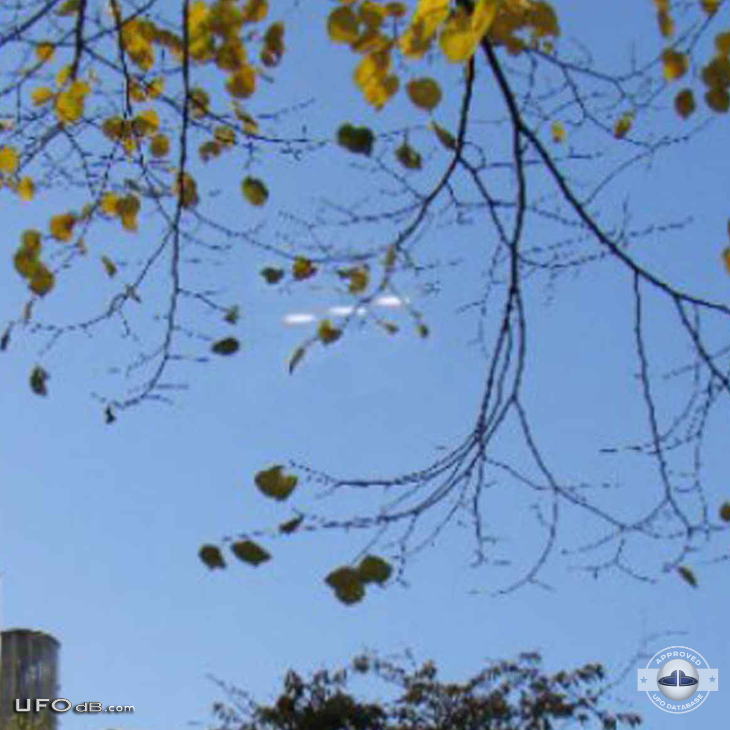 Fleet of 3 UFOs in formation caught on picture over Amsterdam in 2011 UFO Picture #378-2