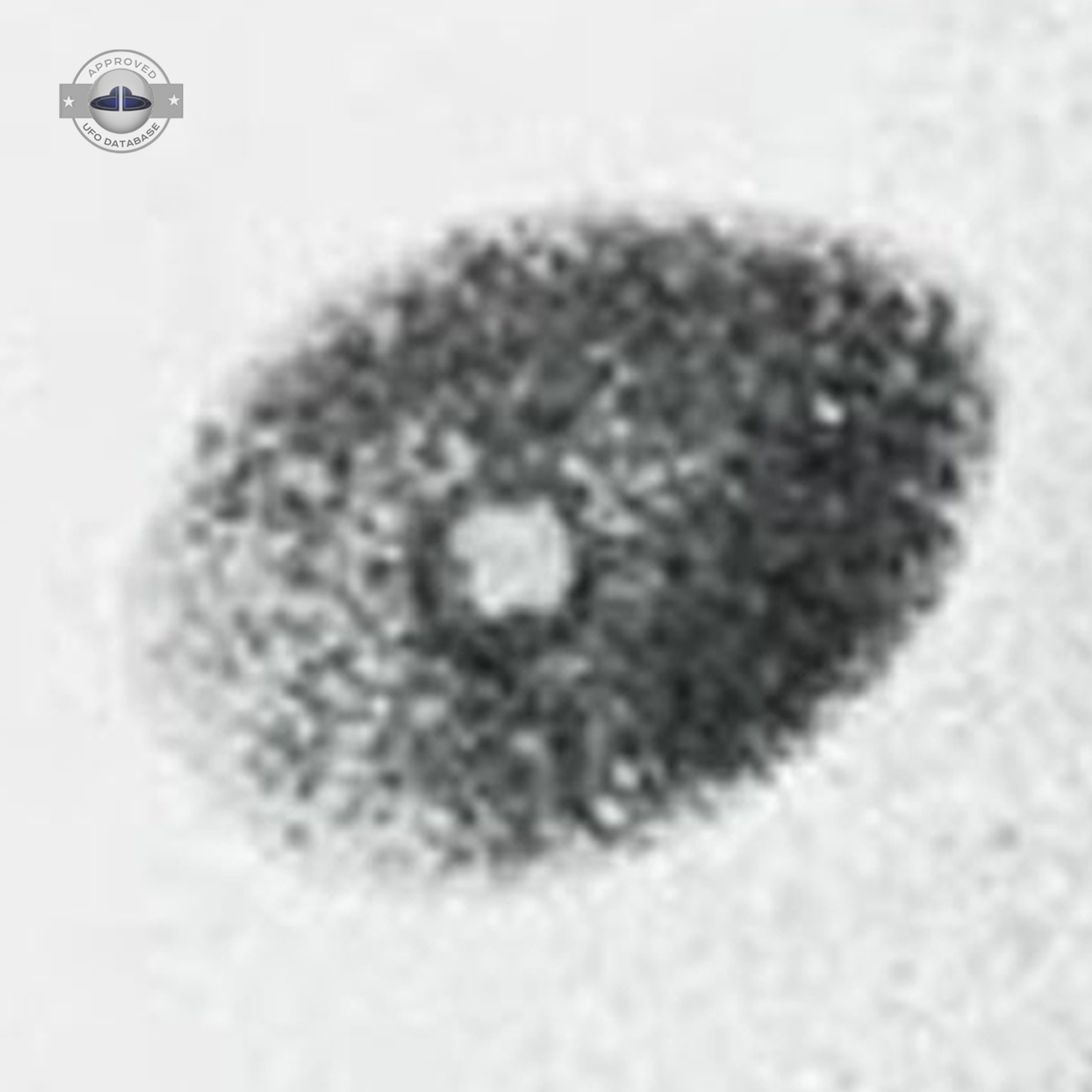 UFO was photograph in the early lights of dawn on May 17 1958 USA UFO Picture #127-4