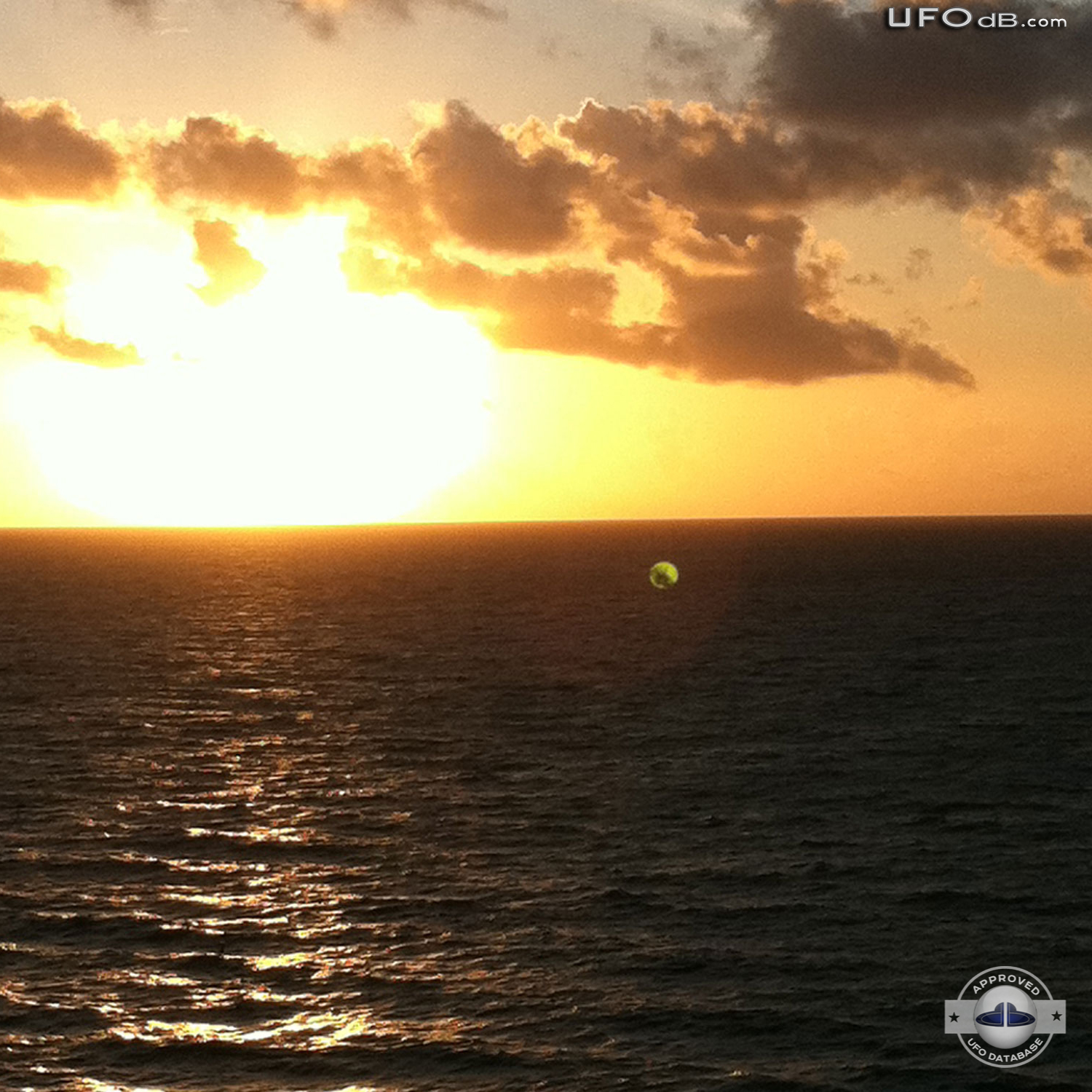 Green Sphere UFO caught on picture over the ocean | Miami Beach | 2011 UFO Picture #356-1