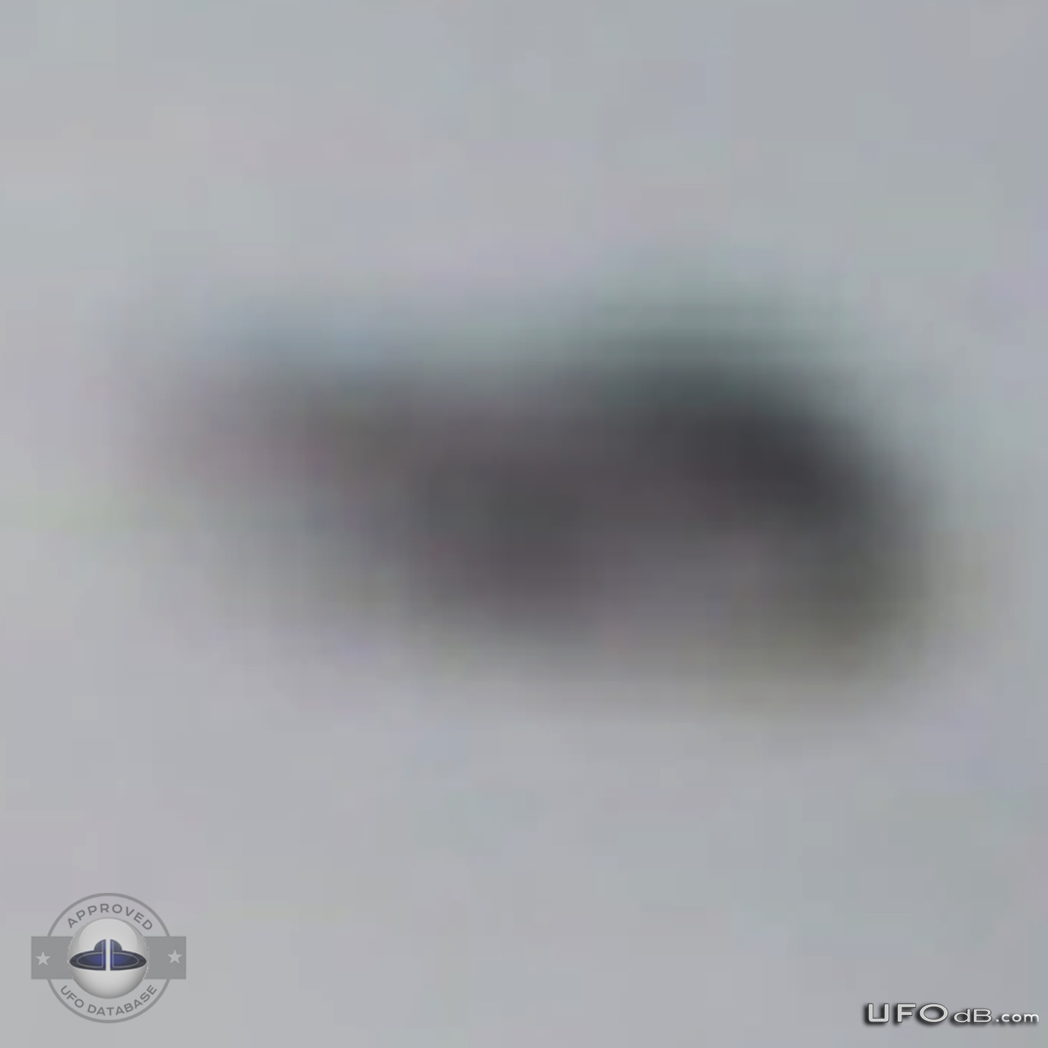 KLM Airplane passenger see UFO near wing | Amsterdam, Netherlands 2006 UFO Picture #255-6
