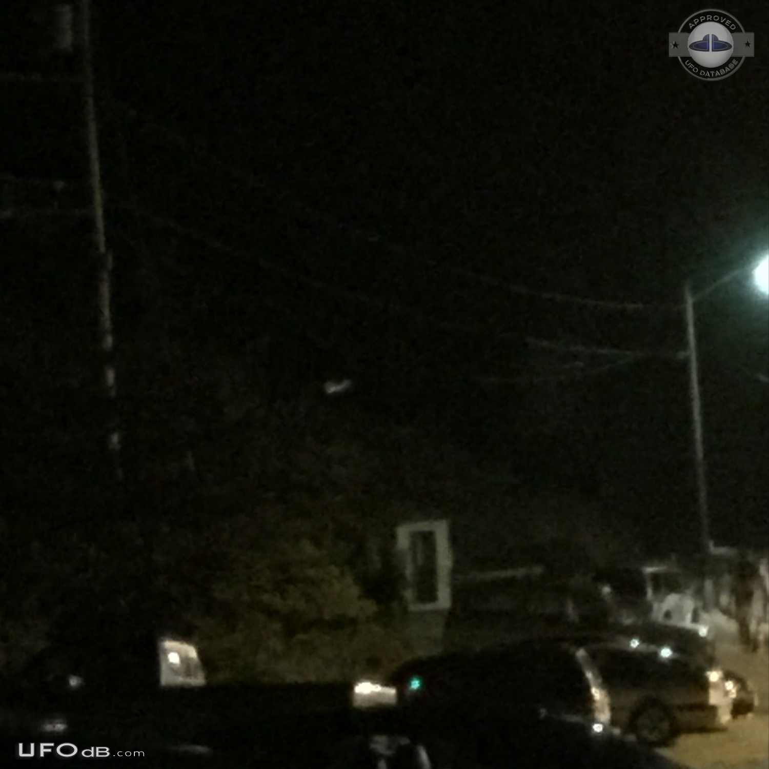 Looked like mothership with smaller glowing craft flying around it in  UFO Picture #708-1