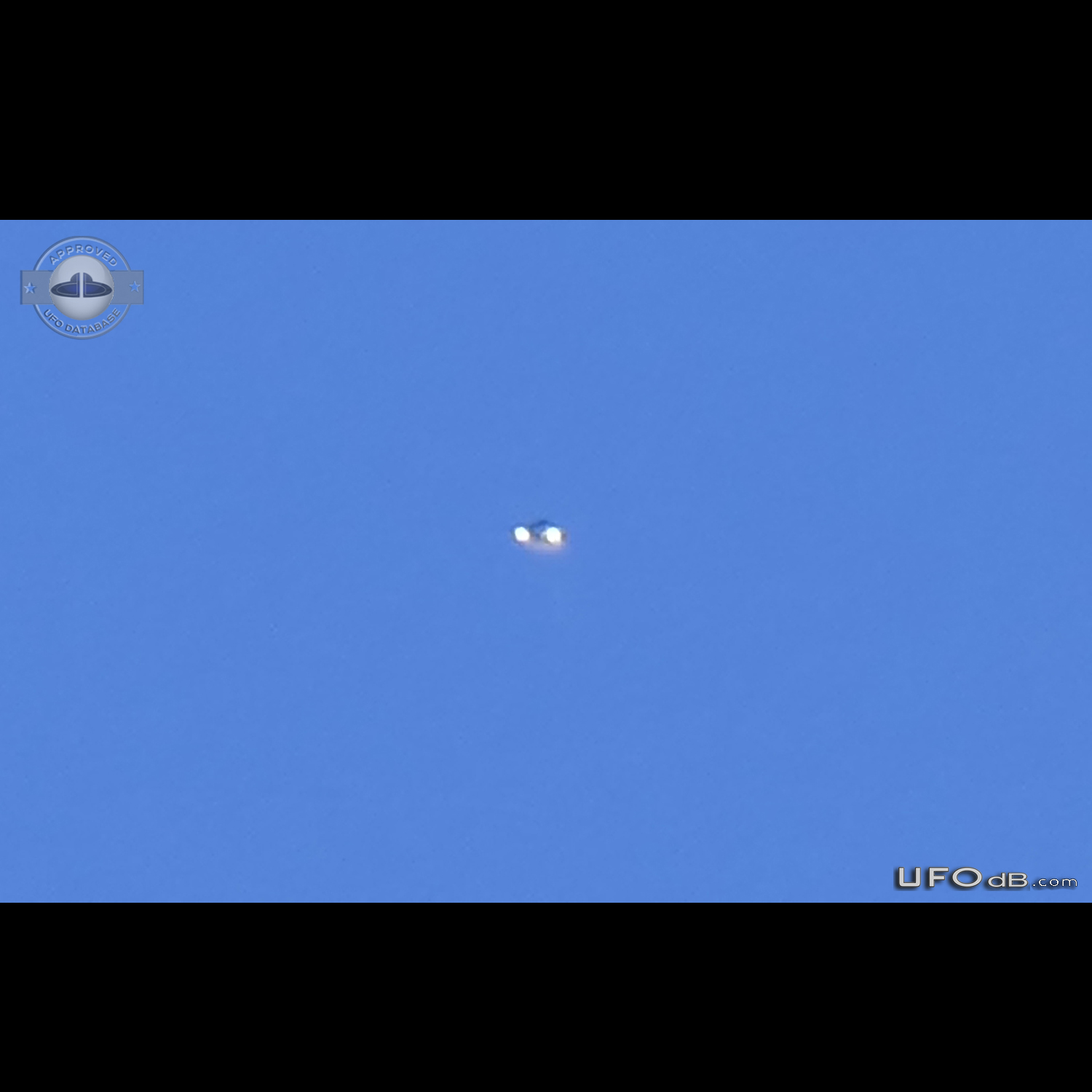 Looked up at a high altitude jet stream, saw a glint UFO shinning Ariz UFO Picture #809-4