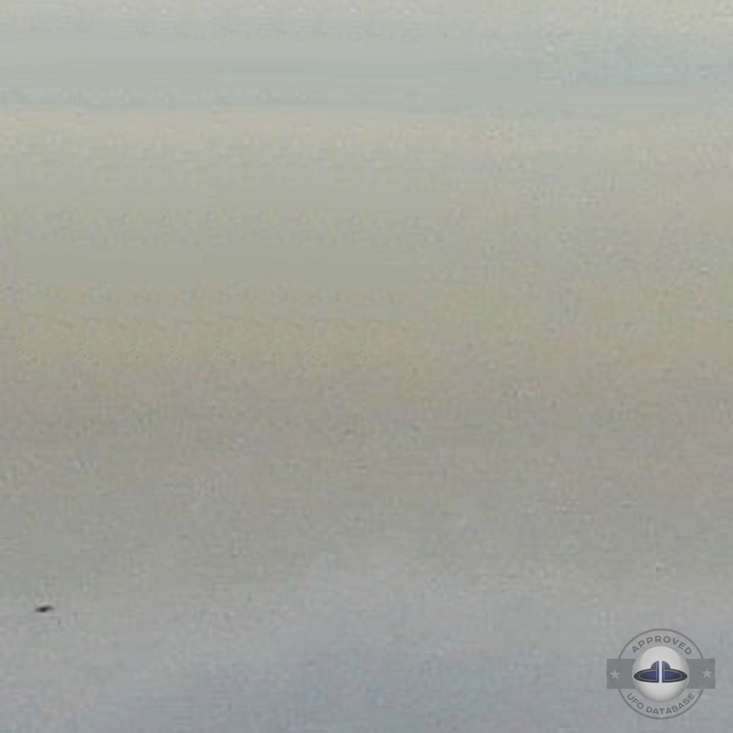 UFO picture taken in 2005 showing ufo close to coming airplane UFO Picture #24-2