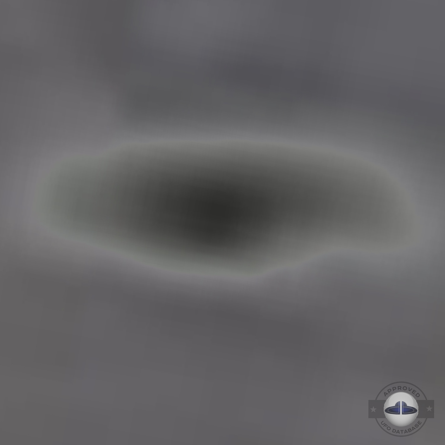 UFO picture taken in 2005 showing ufo close to coming airplane UFO Picture #24-6