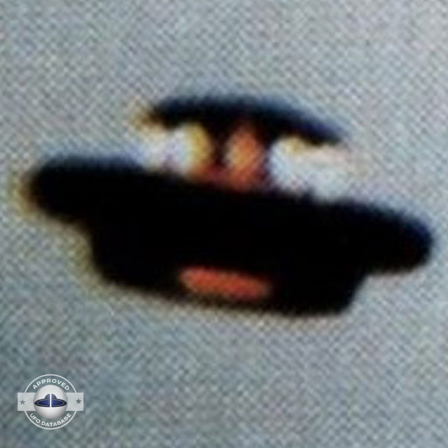 We can see 2 kind of glowing lights, big whites and smaller red ones UFO Picture #66-4
