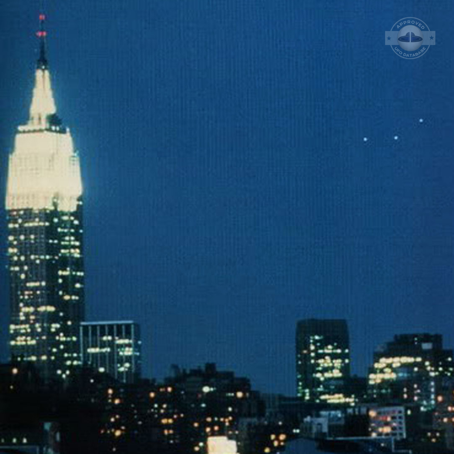 UFO picture showing 3 bright white UFO over Empire State Building UFO Picture #35-2