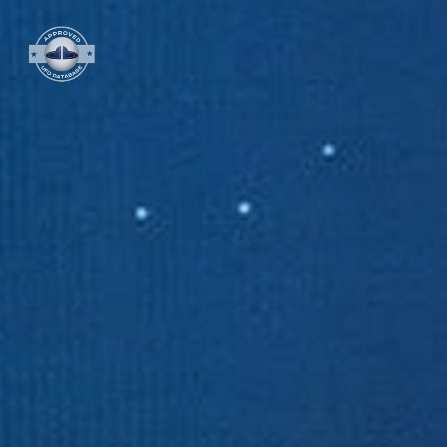 UFO picture showing 3 bright white UFO over Empire State Building UFO Picture #35-4