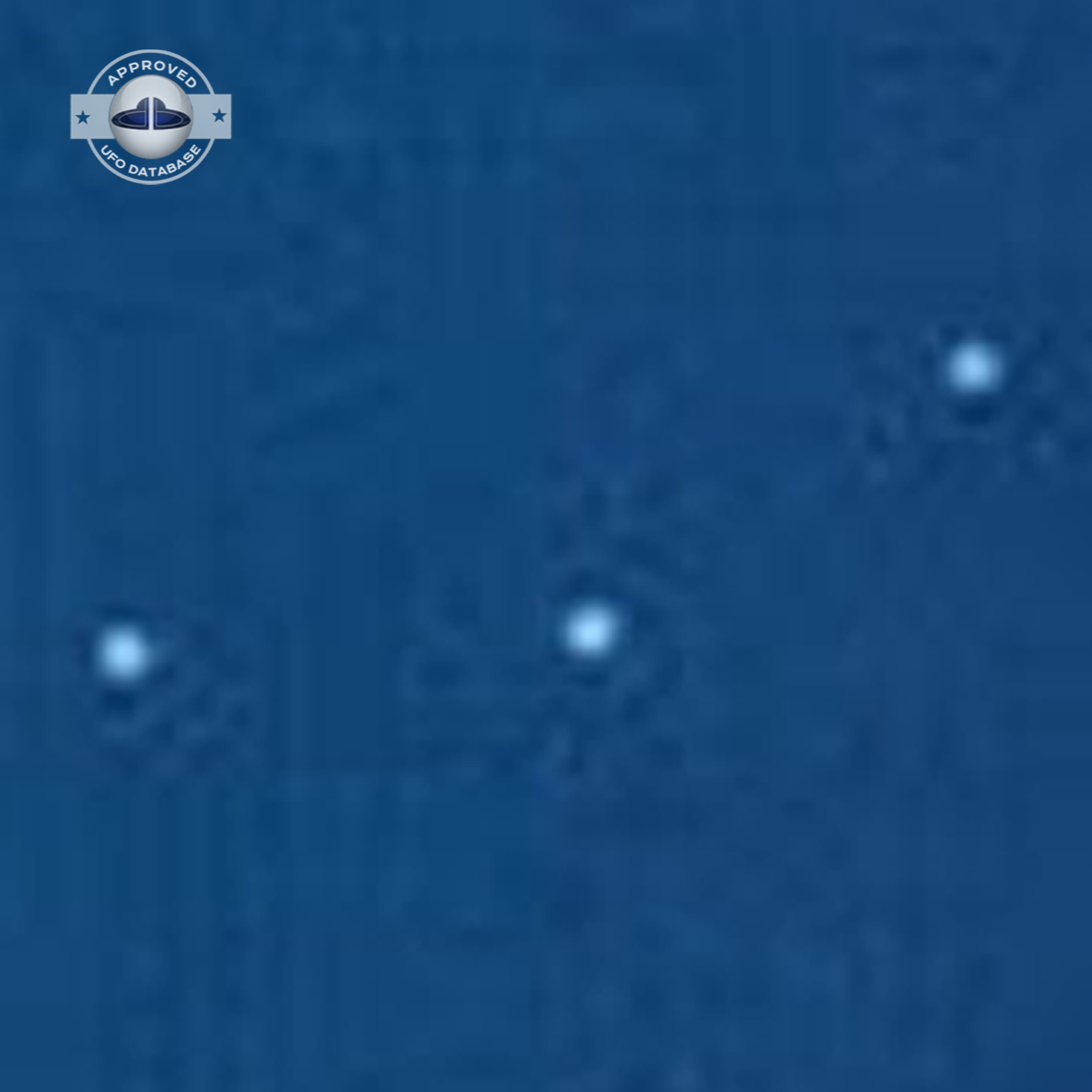 UFO picture showing 3 bright white UFO over Empire State Building UFO Picture #35-5