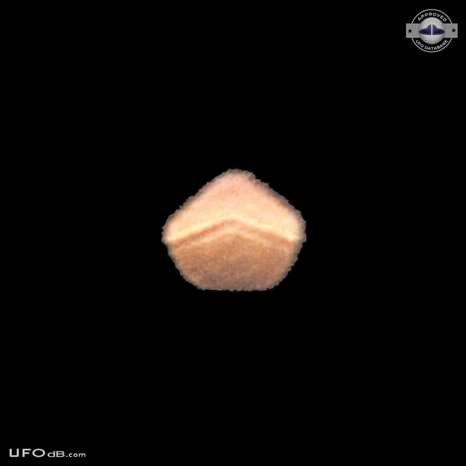 Orange UFO with strange shape zig zagging in the sky - Wales, UK 2012 UFO Picture #409-1