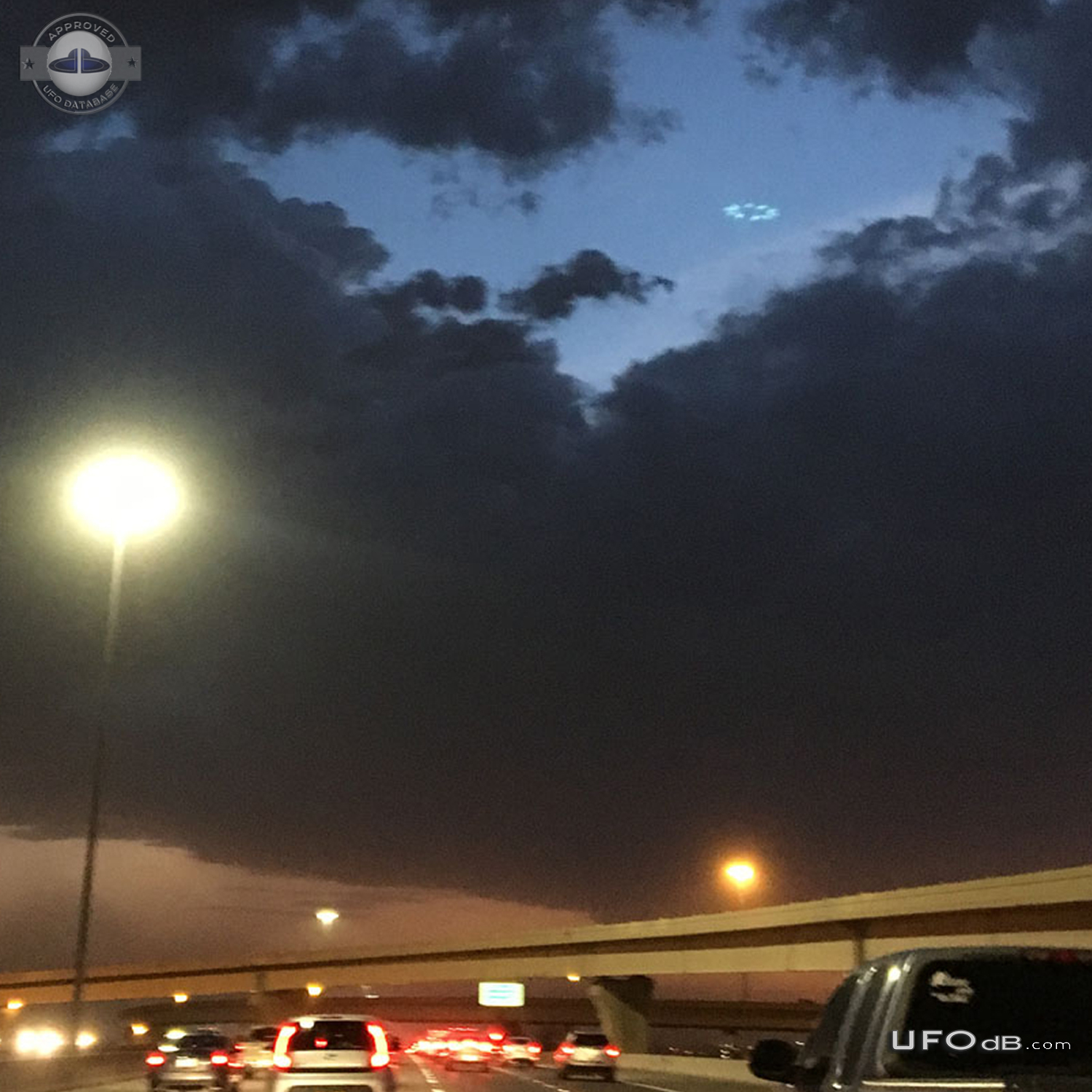Photo during storm get saucer UFO in cloud hole Phoenix Arizona USA 20 UFO Picture #814-2