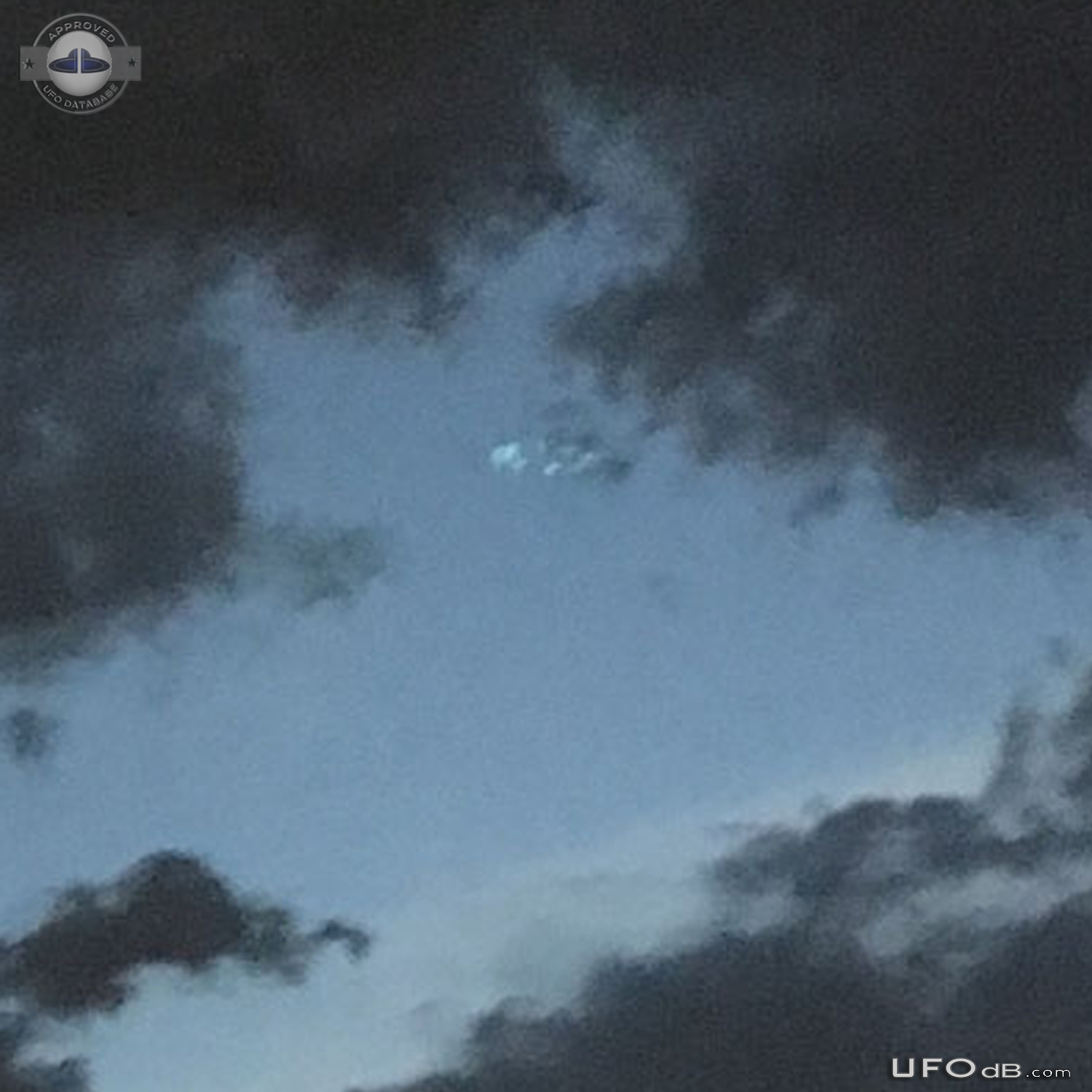 Photo during storm get saucer UFO in cloud hole Phoenix Arizona USA 20 UFO Picture #814-7