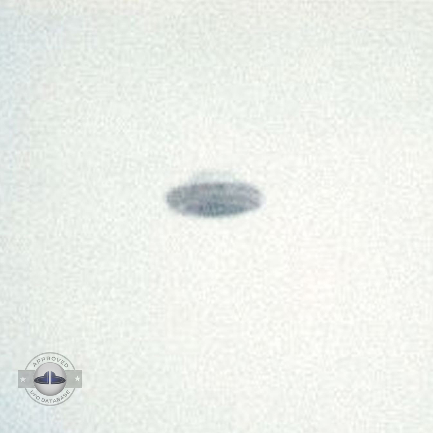 UFO picture showing UFO over snowy mountains during the day UFO Picture #36-3