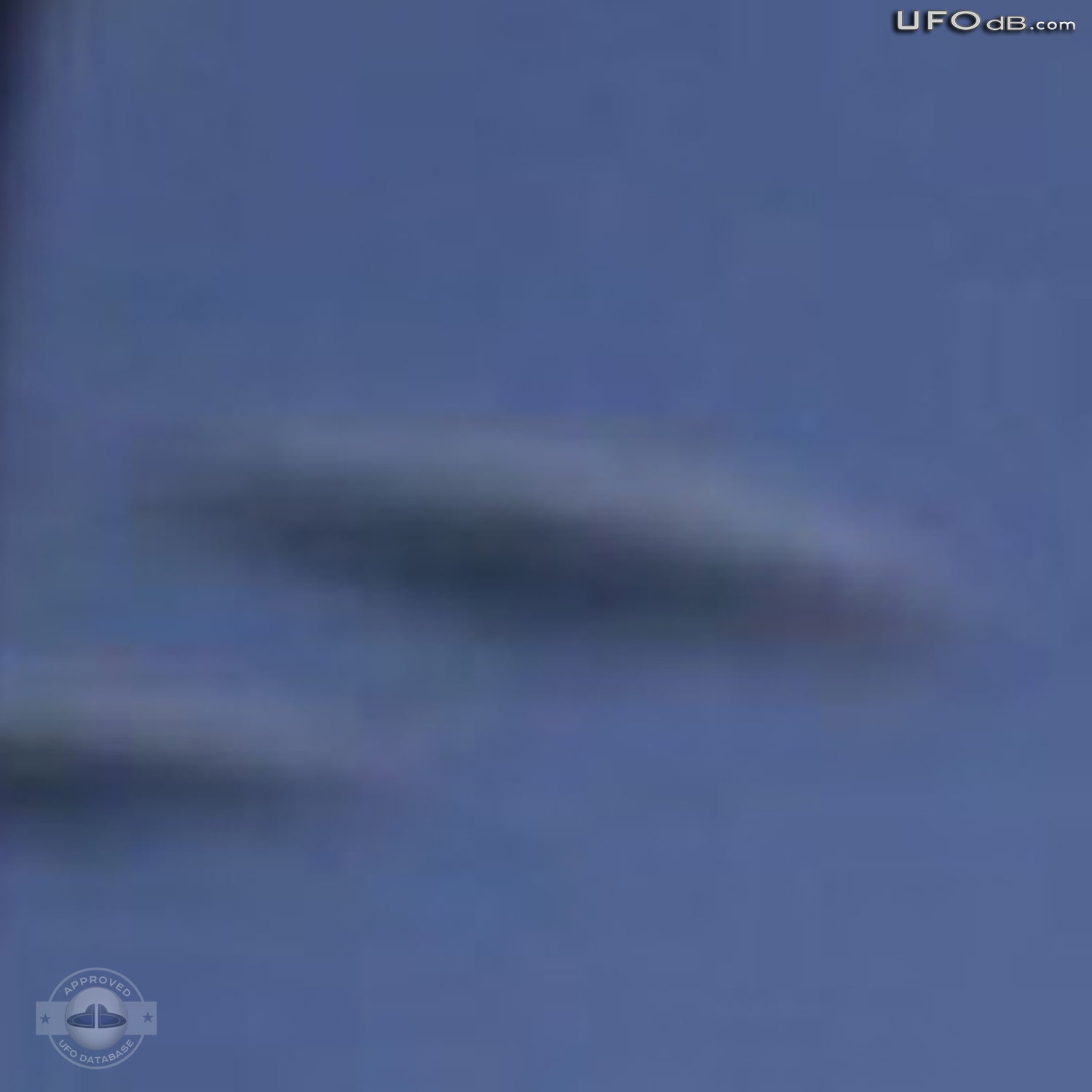 Random picture taken from airplane over Germany captures 3 saucer UFOs UFO Picture #362-4