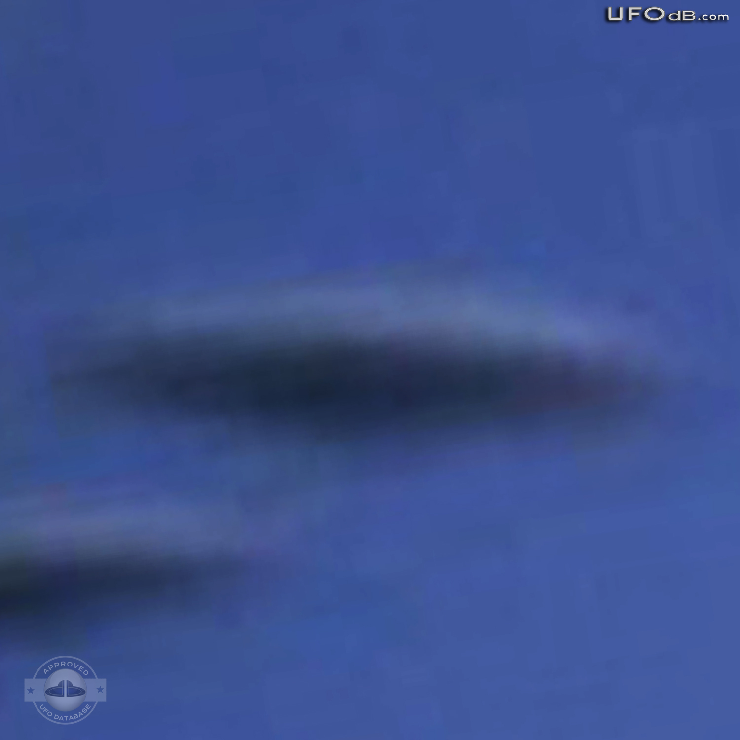 Random picture taken from airplane over Germany captures 3 saucer UFOs UFO Picture #362-5