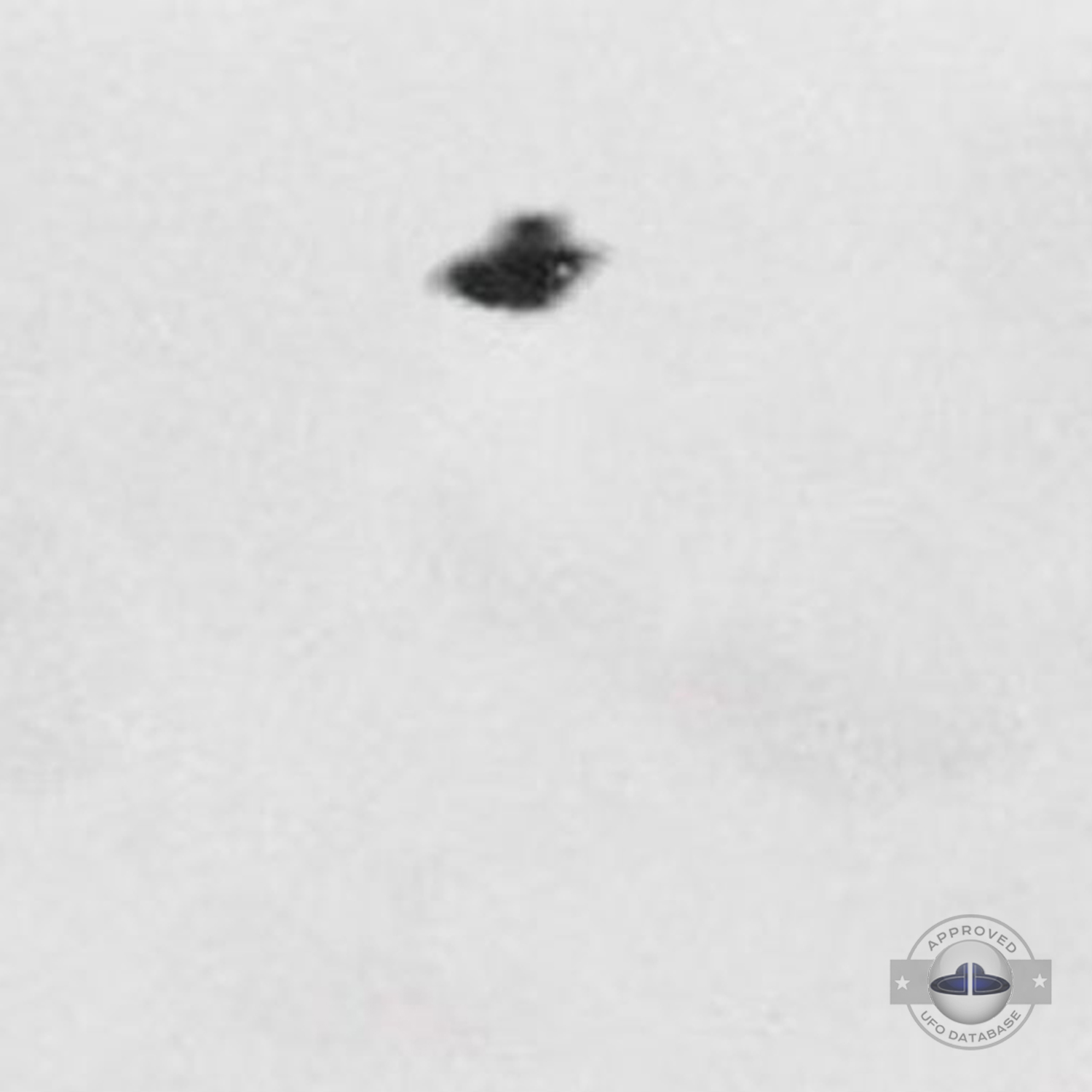 Old grey UFO picture showing an UFO passing over Rome