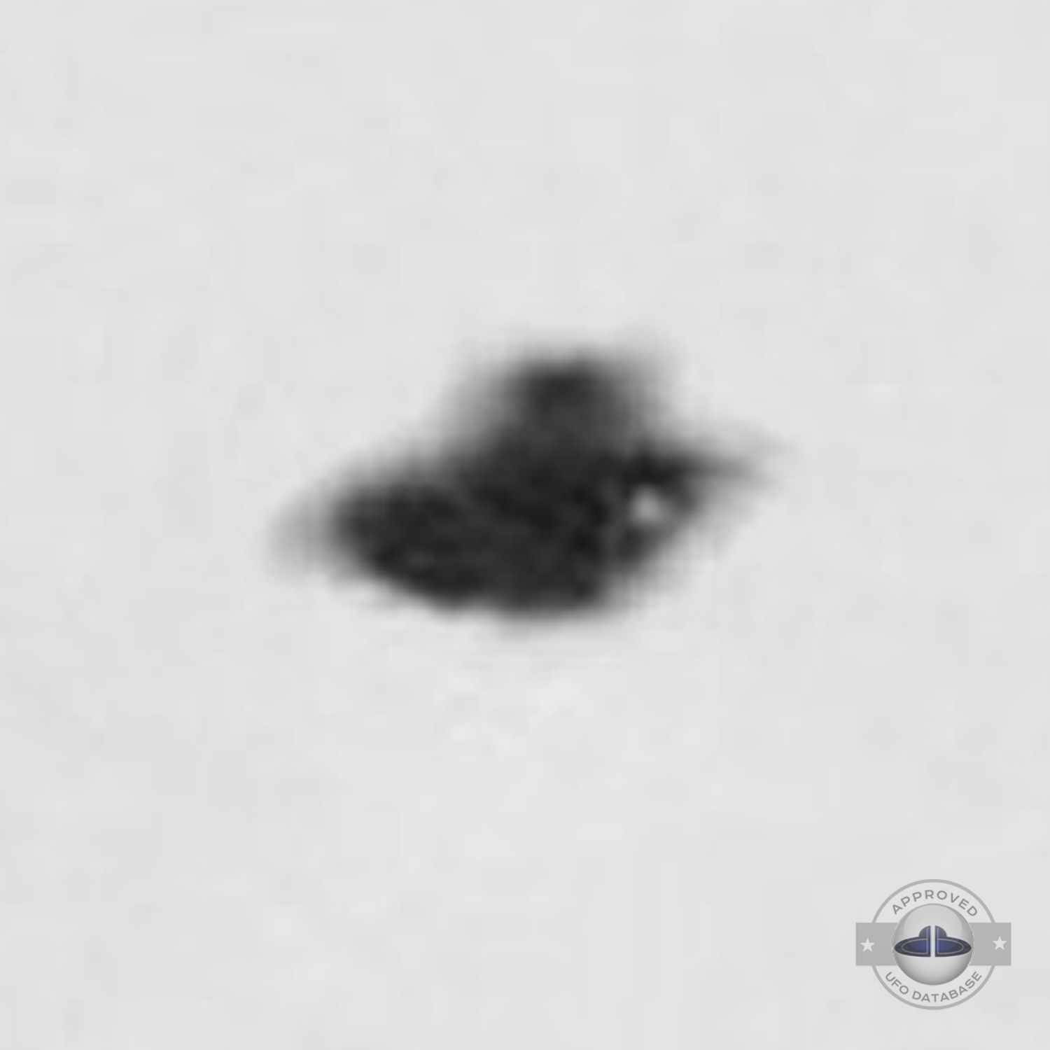Old grey UFO picture showing an UFO passing over Rome