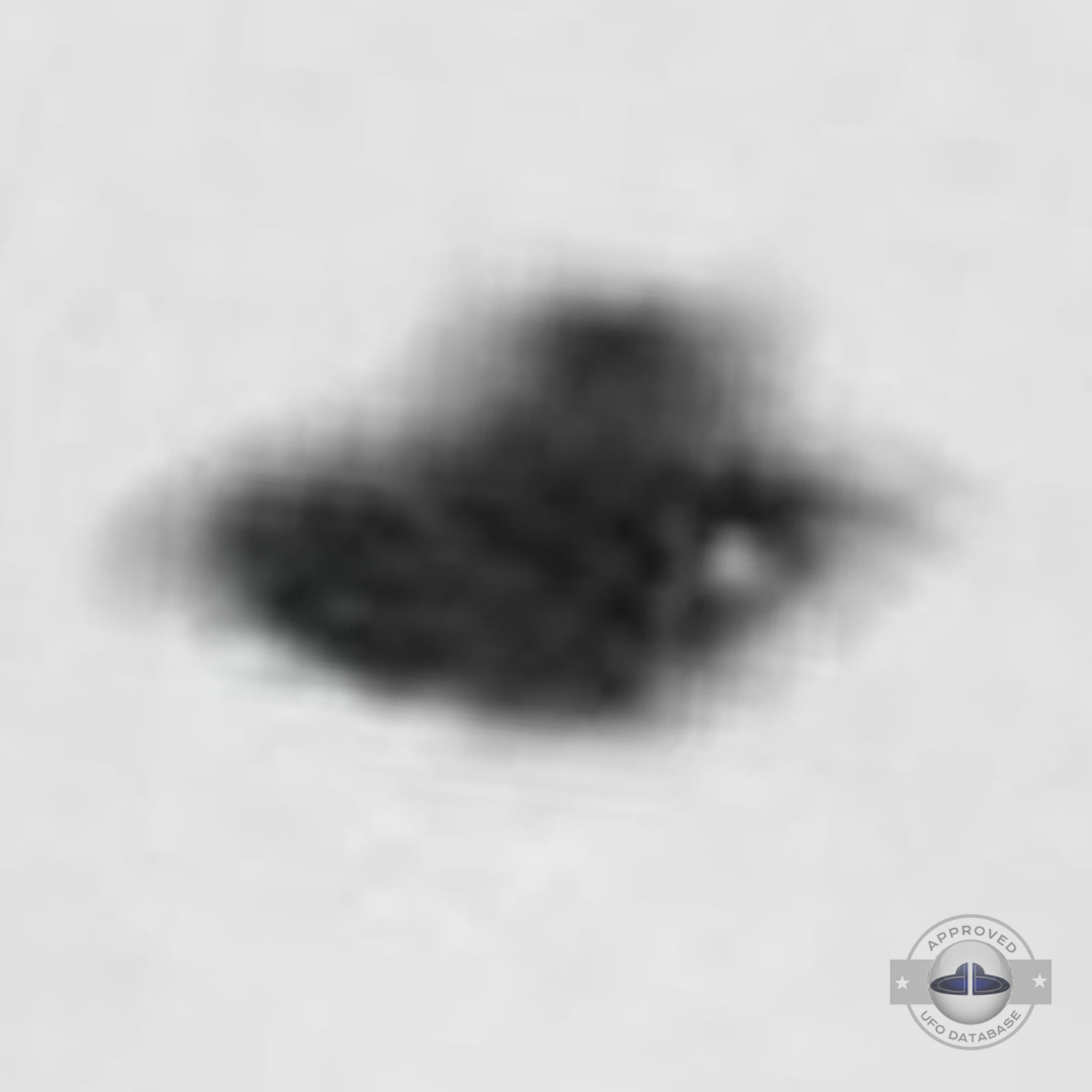 Old grey UFO picture showing an UFO passing over Rome