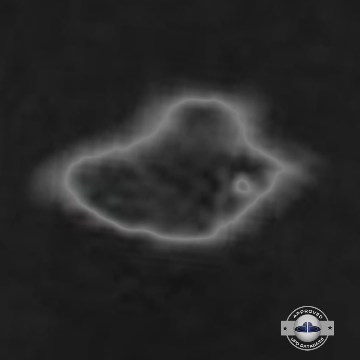 Old grey UFO picture showing an UFO passing over Rome
