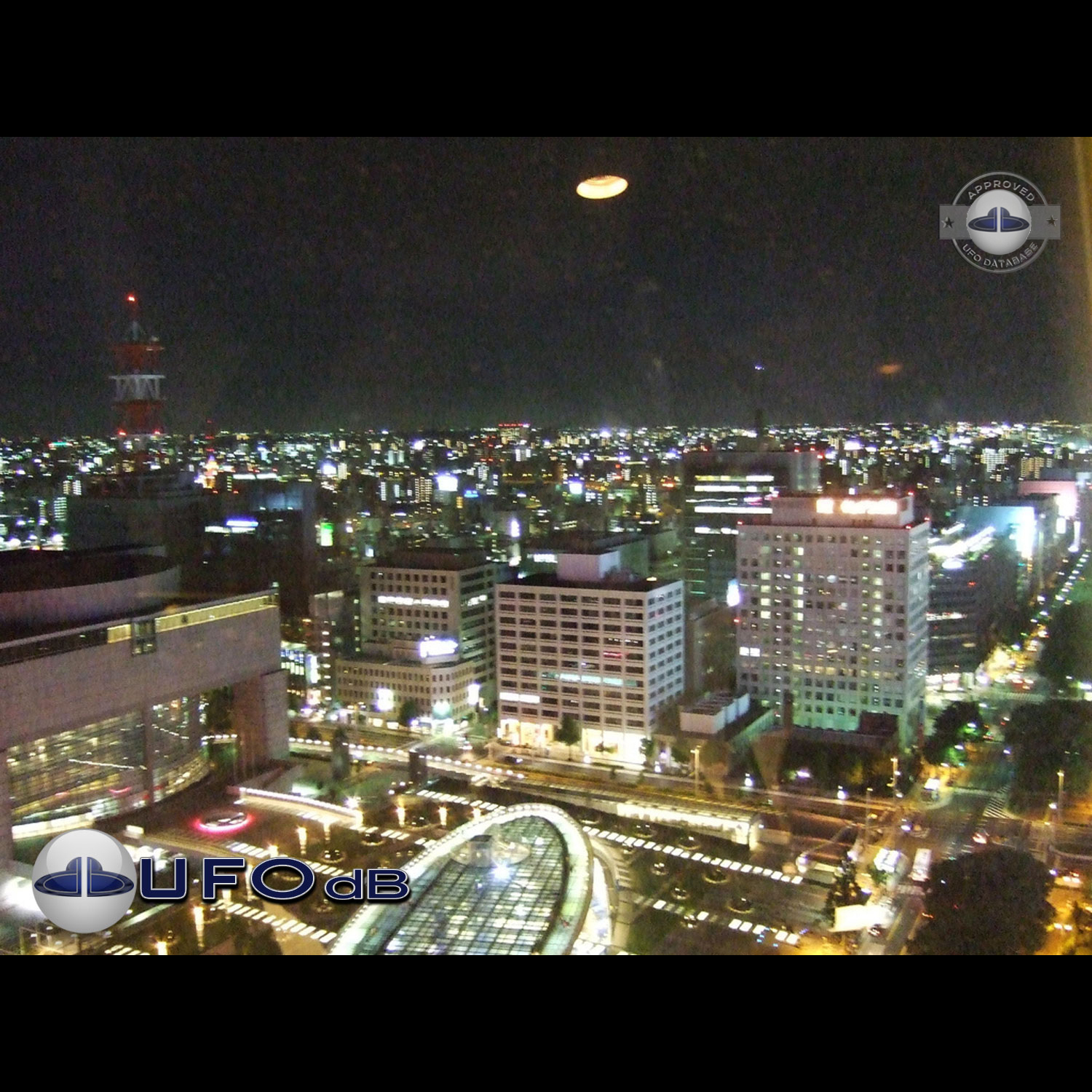 Light Orange glowing UFO saucer over Nagoya, Chubu | Japan 2007 UFO Picture #201-1