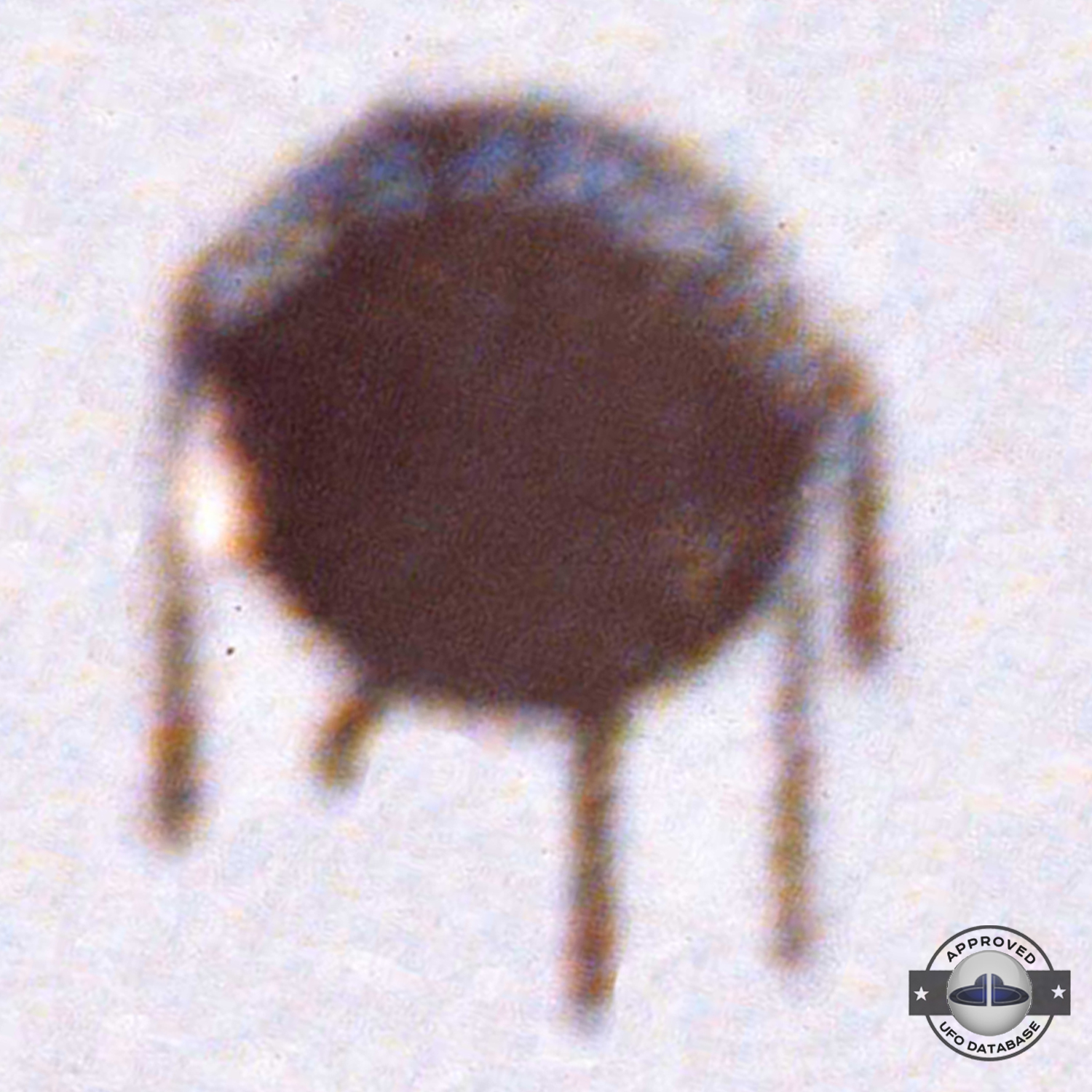 Strange UFO similar to Sputnik satellite seen in Alfena Portugal 1990 UFO Picture #472-4
