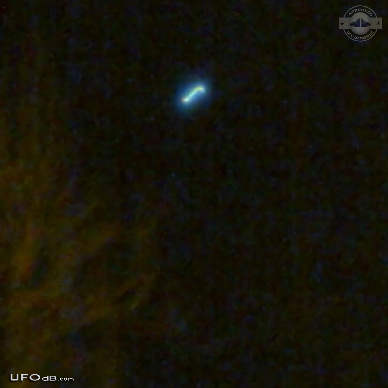 Student get a UFO on picture with cellular over Satu-Mare Romania 2010 UFO Picture #454-2