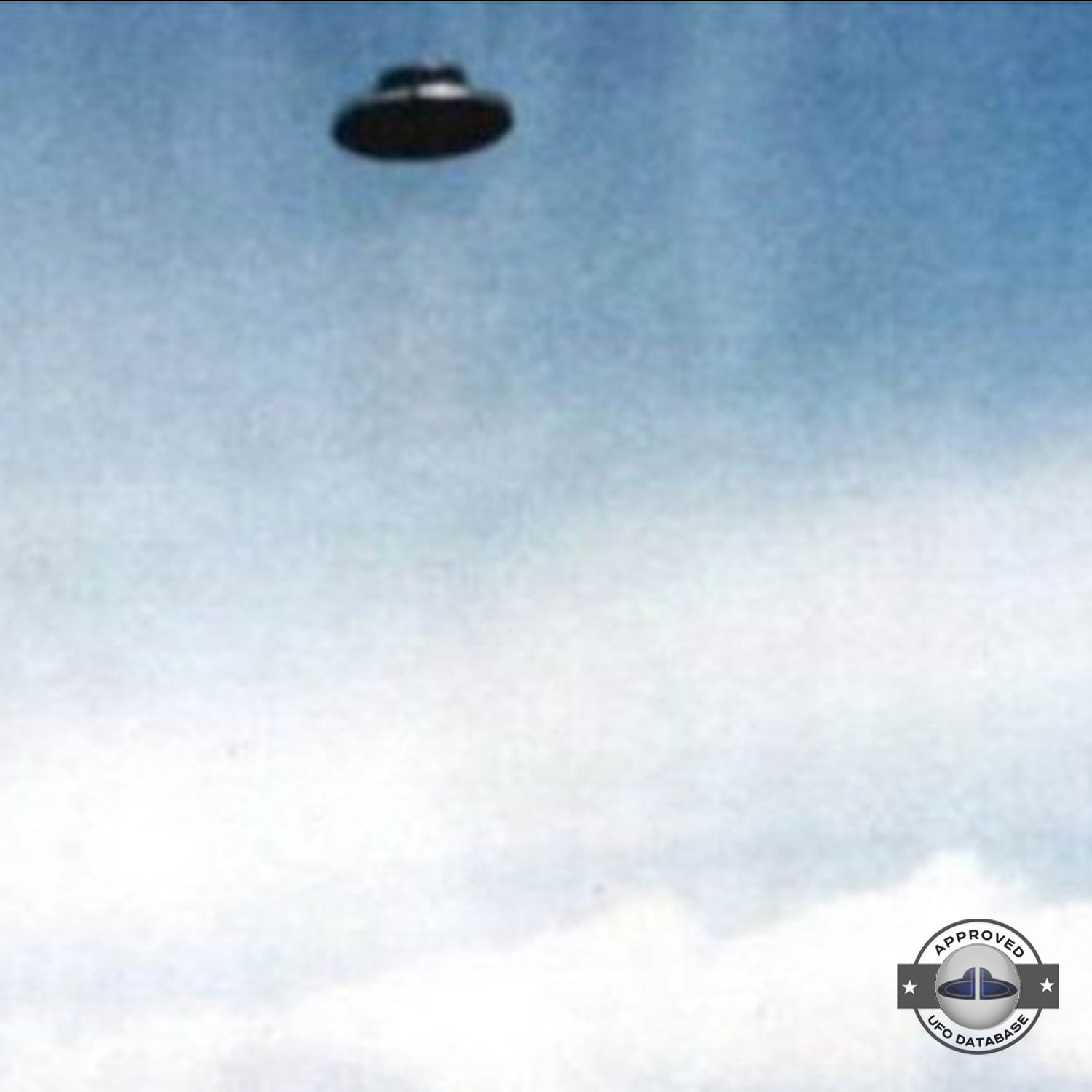 UFO picture - UFO in clear blue sky over one of the pyramid | Mexico UFO Picture #148-2