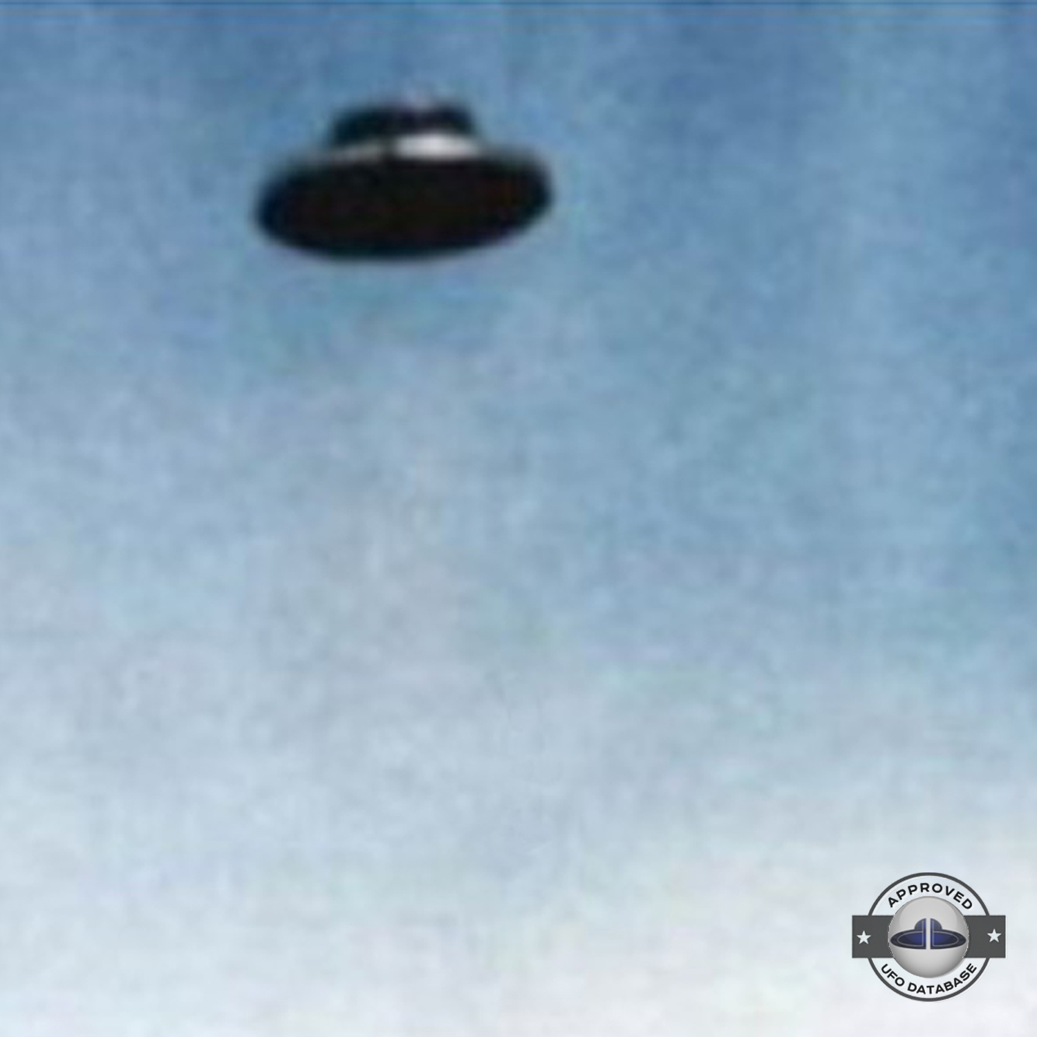 UFO picture - UFO in clear blue sky over one of the pyramid | Mexico UFO Picture #148-3