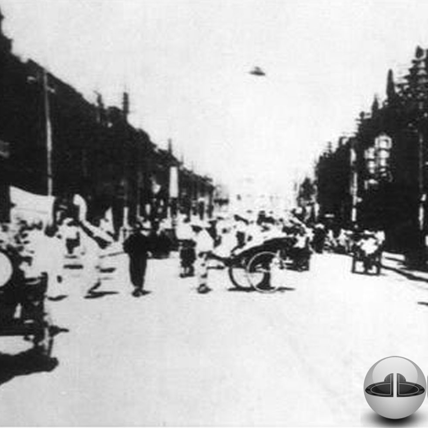 Black and white UFO picture showing UFO flying over busy street UFO Picture #43-2