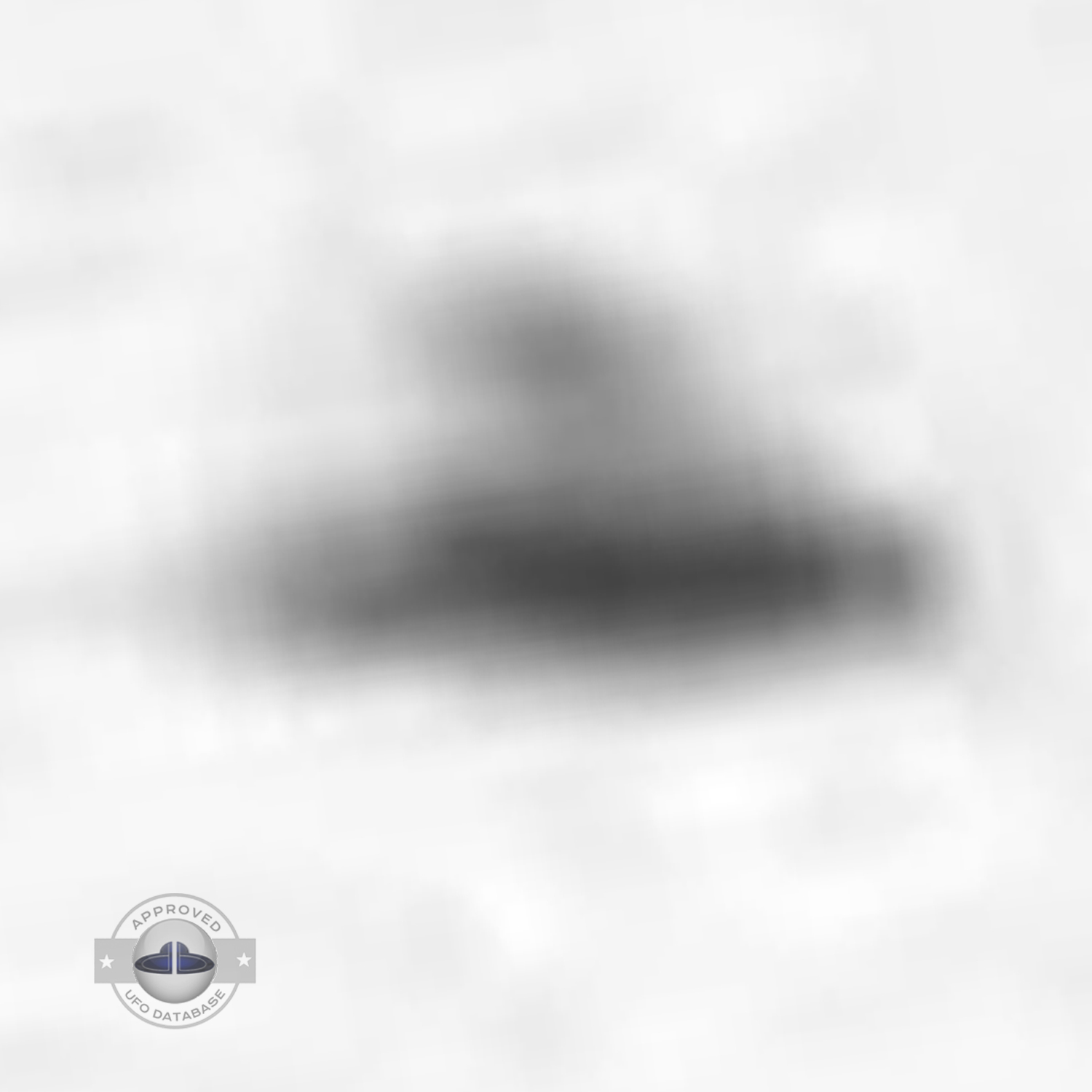 Black and white UFO picture showing UFO flying over busy street UFO Picture #43-6