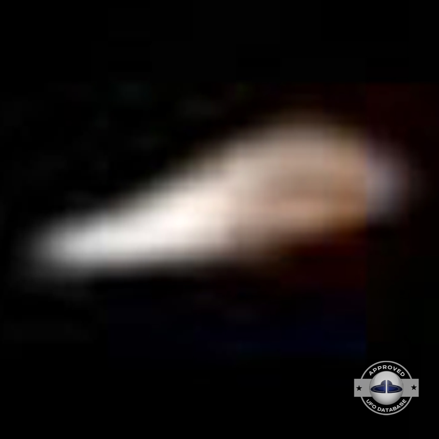 we can see people in a small boat, and behind them a UFO passing UFO Picture #40-6