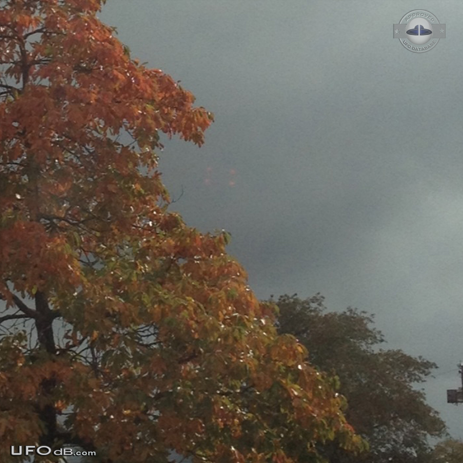 UFO made of 4 red dots in the grey sky of Bellmawr New Jersey USA 2012 UFO Picture #508-1