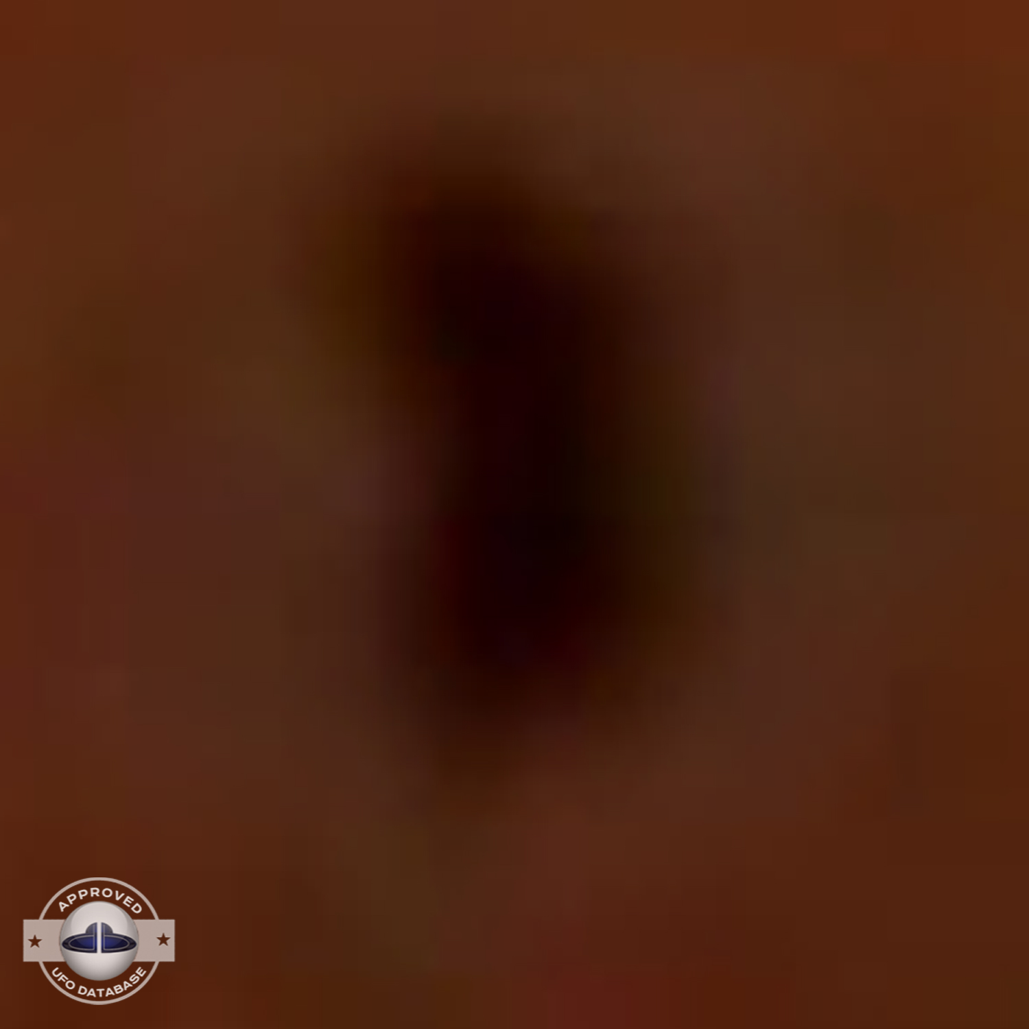 UFO flying over dark blue water near the shore of Lake Michigan USA UFO Picture #97-6