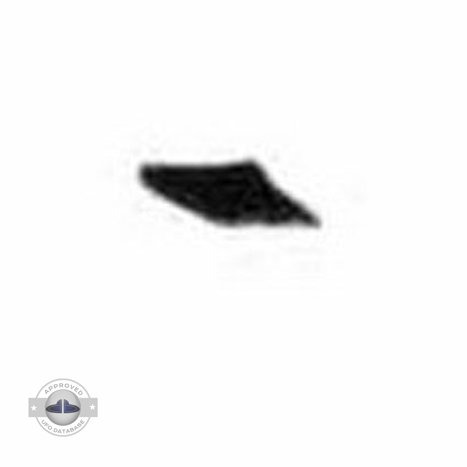 UFO seen over mountain and forest with seem to be snow on the ground UFO Picture #75-4