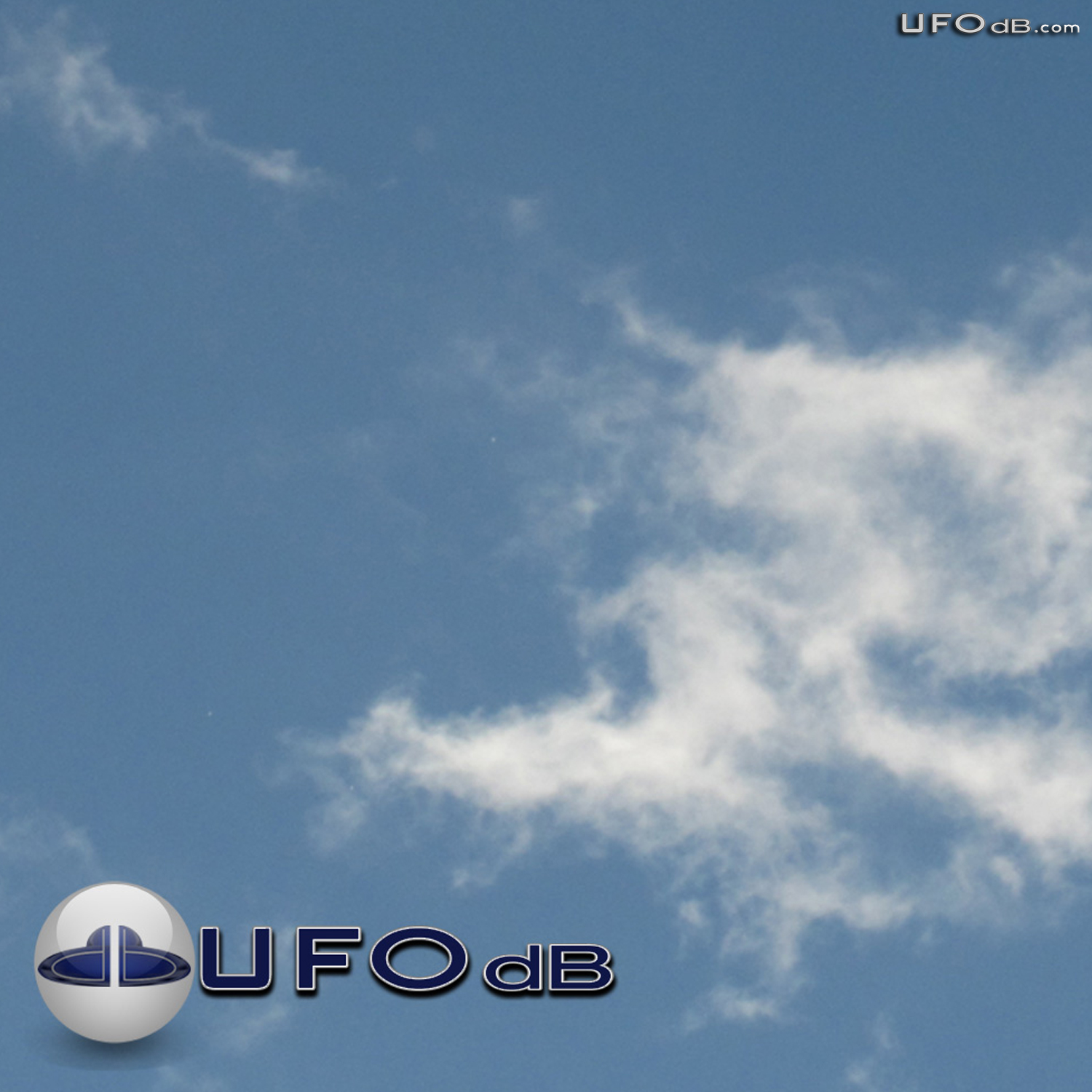 White disc UFOs hides behind clouds Davao Philippines November 3 2010 UFO Picture #340-2