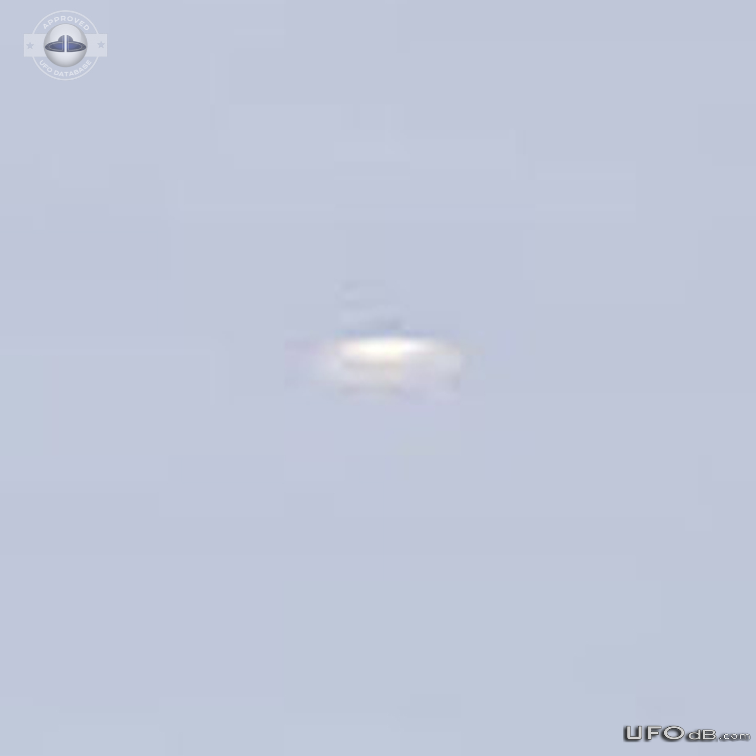 White saucer UFOs in the clouds over the lake in Kelowna BC Canada 201 UFO Picture #816-3